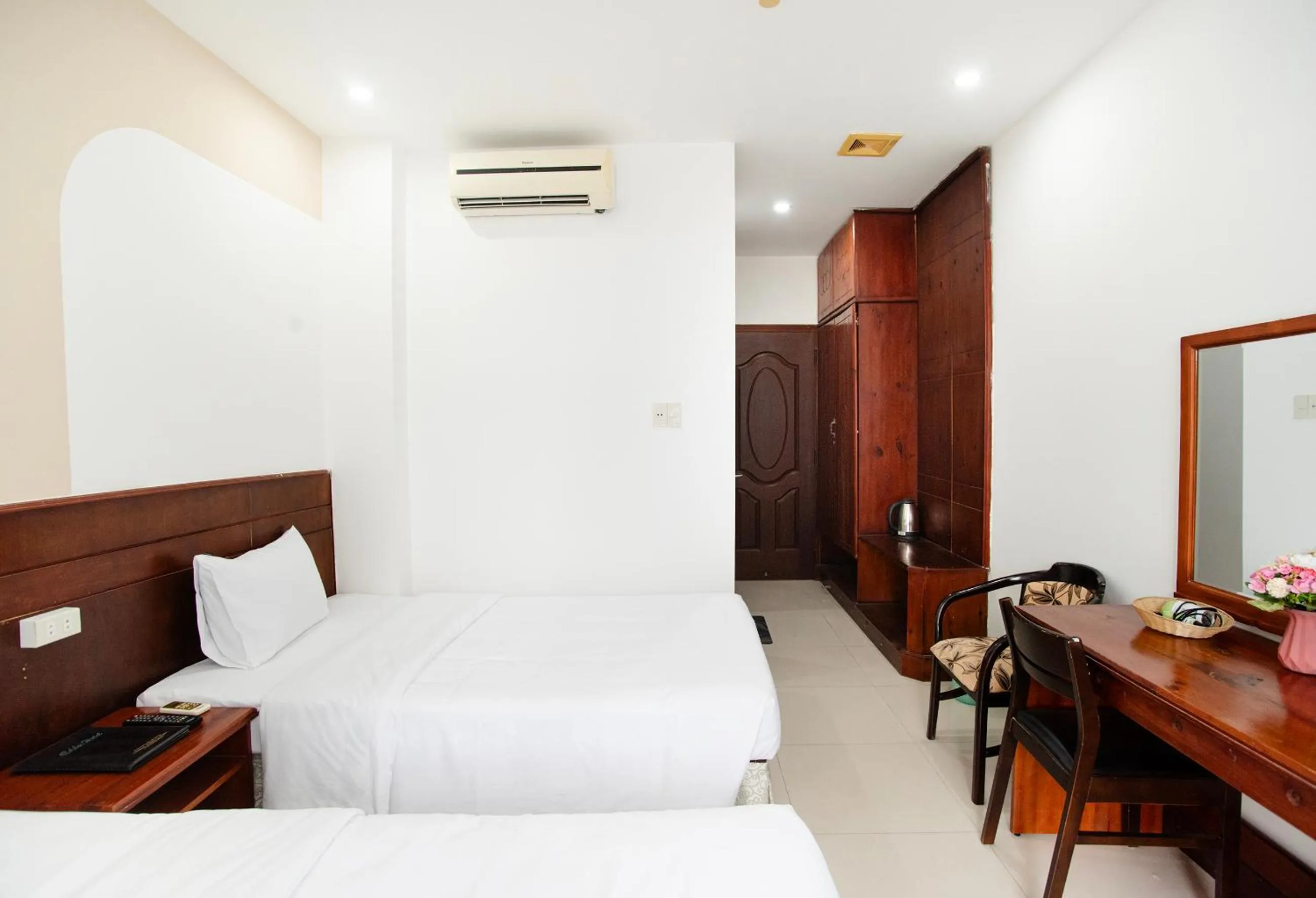 Bed in EDEN QUY NHON HOTEL