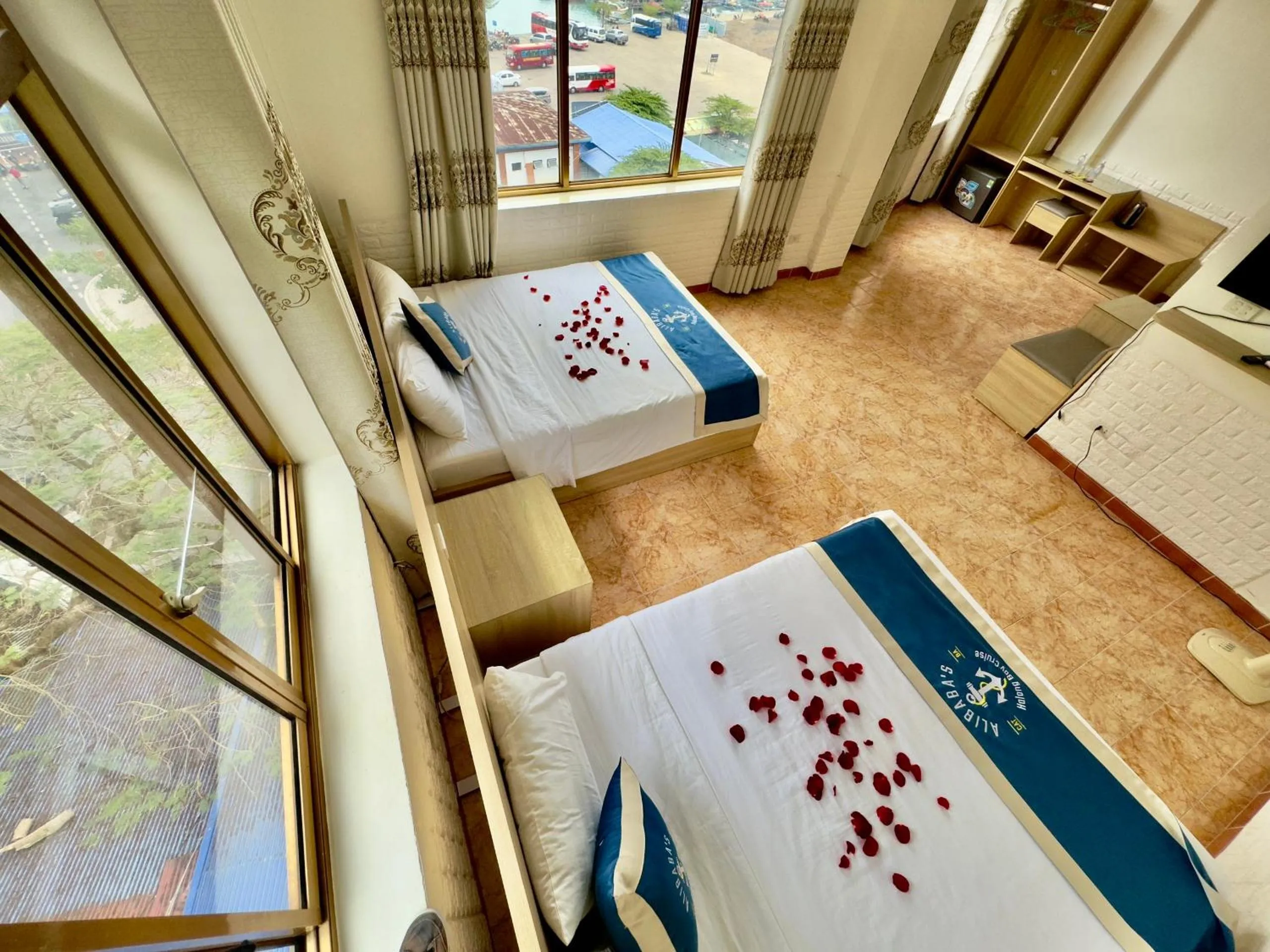 Photo of the whole room, Bed in Cat Ba Plaza Hotel