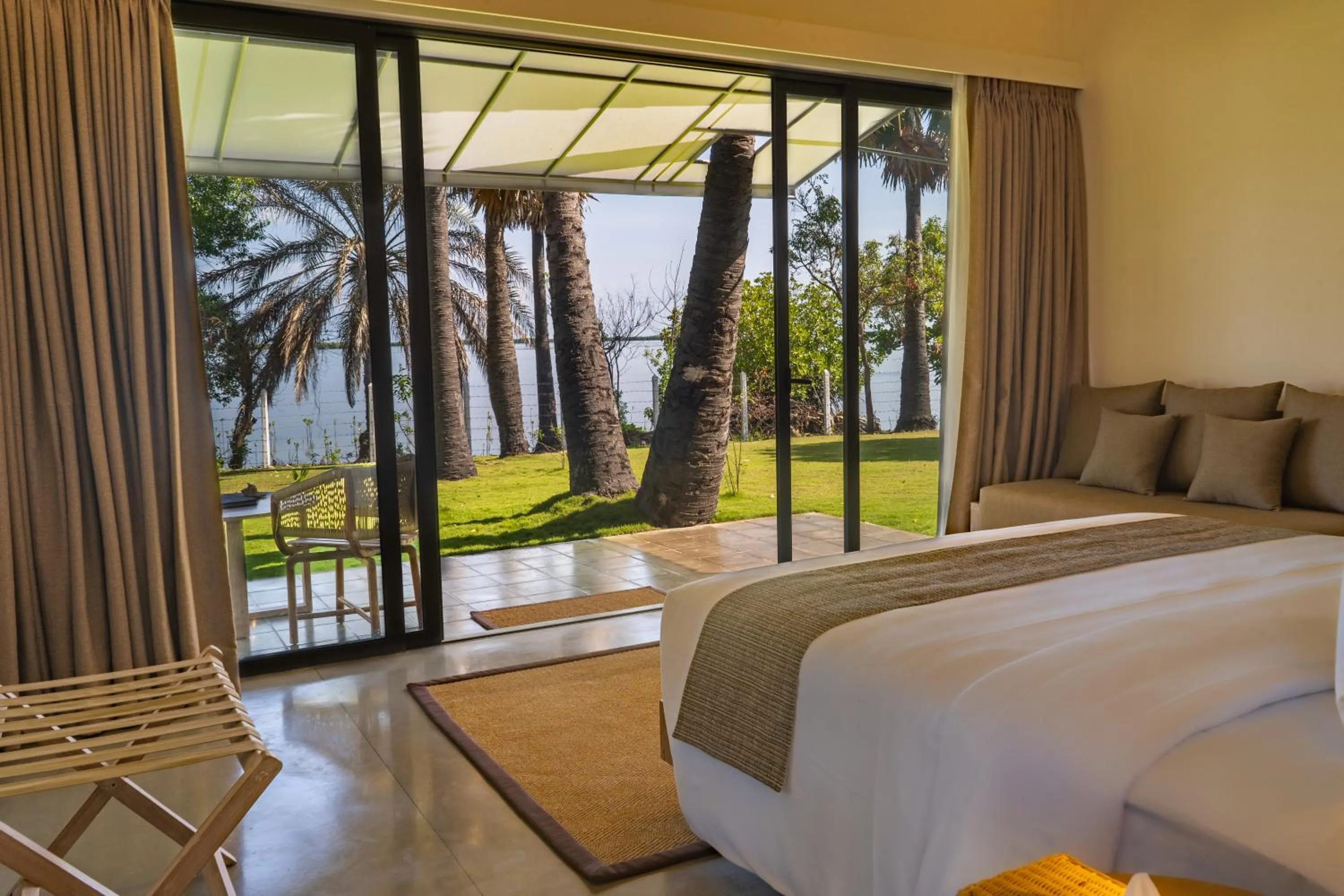 Garden view, Bed in Koddu Kalpitiya