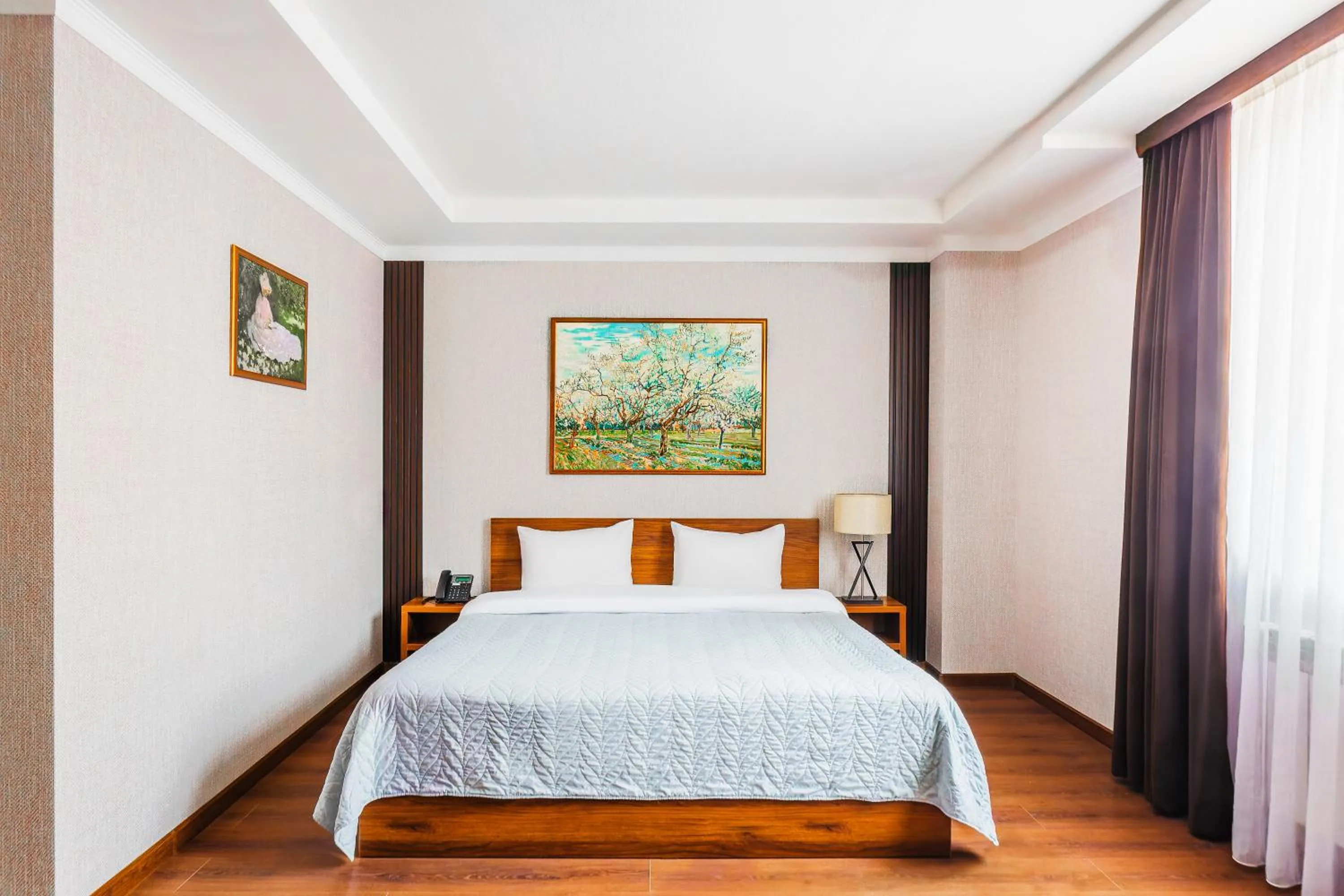 Bed in RICH PARK HOTEL