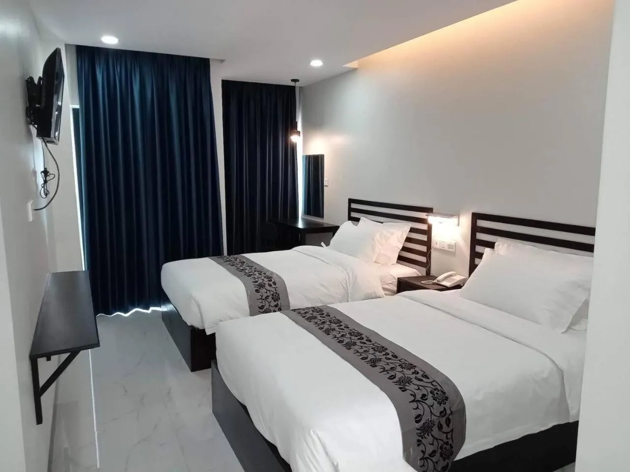Bed in Hotel Chom Chao City