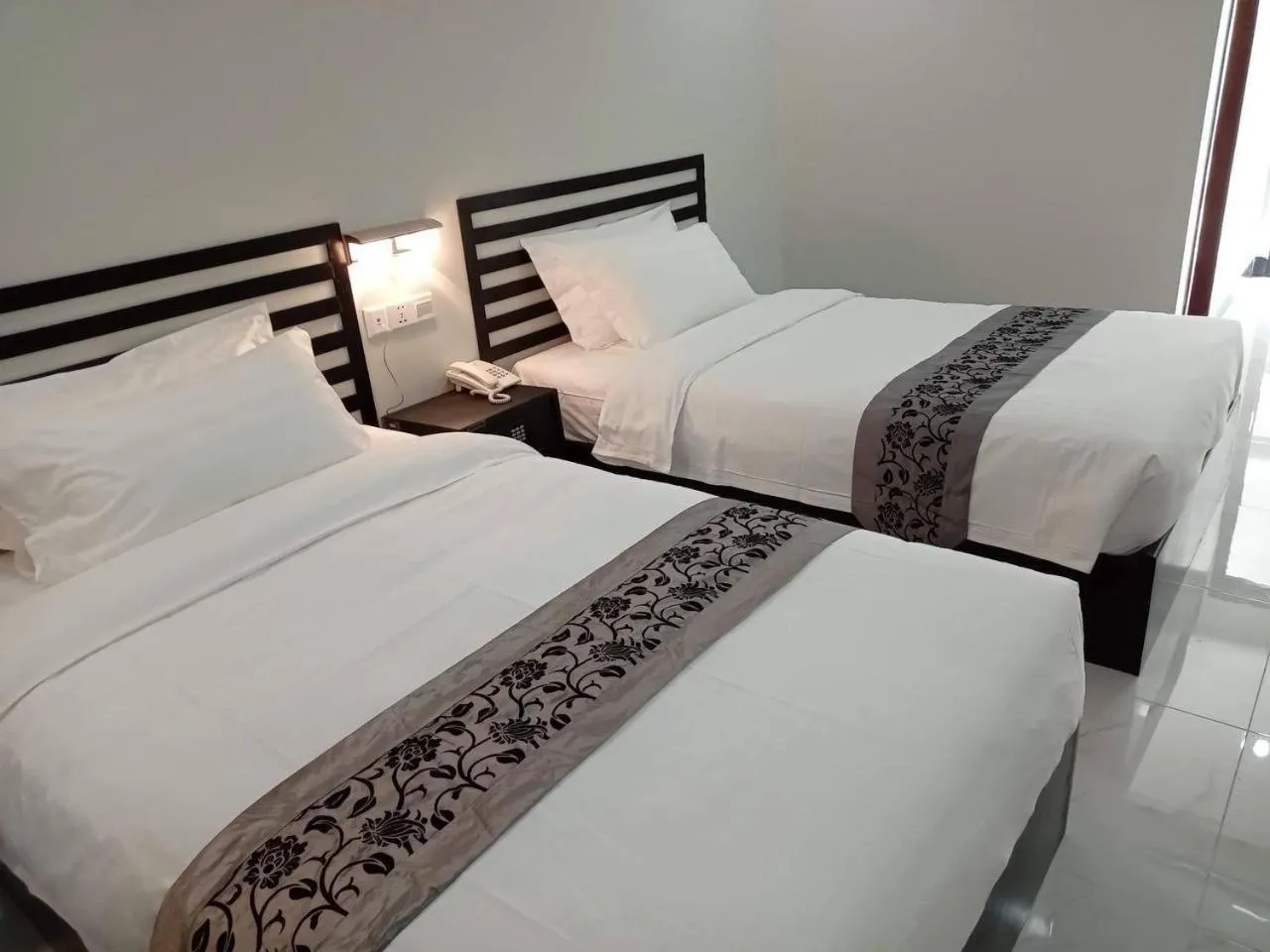 Bed in Hotel Chom Chao City