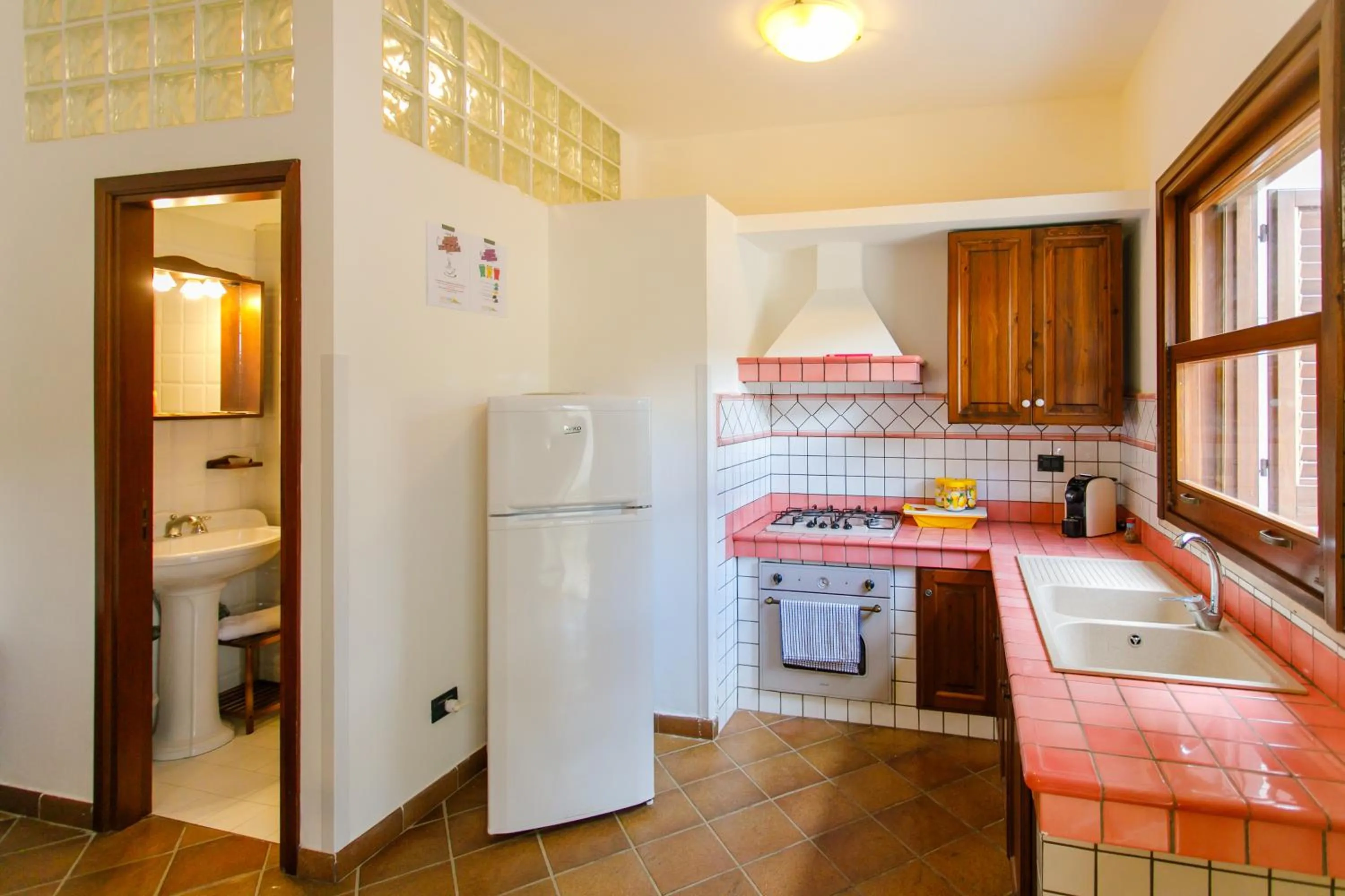 kitchen in SanVitoTour- Residence Il Baglio