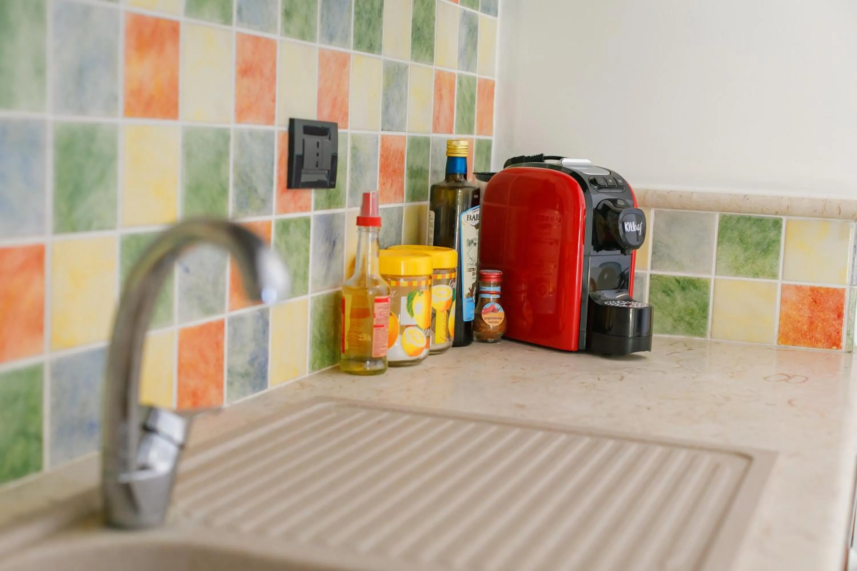 kitchen in SanVitoTour- Residence Il Baglio