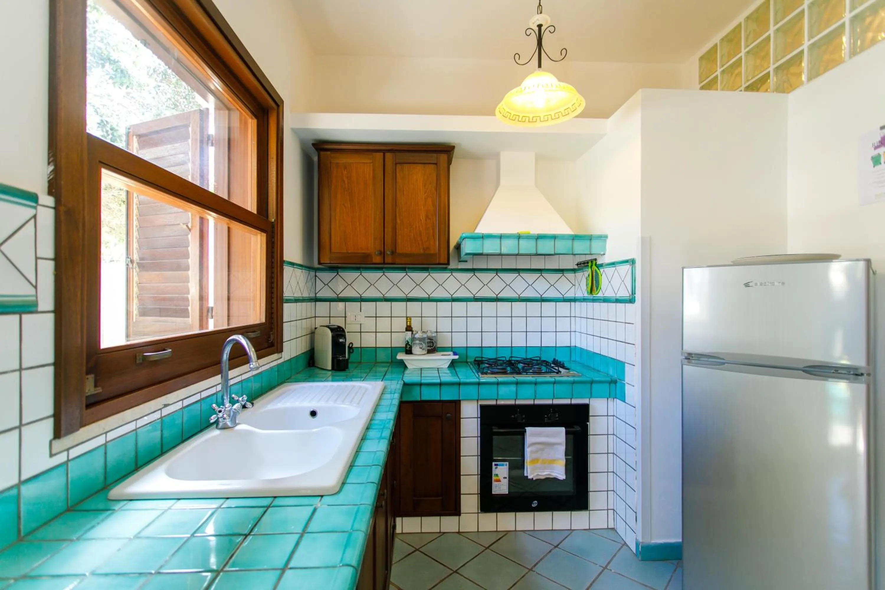 kitchen in SanVitoTour- Residence Il Baglio