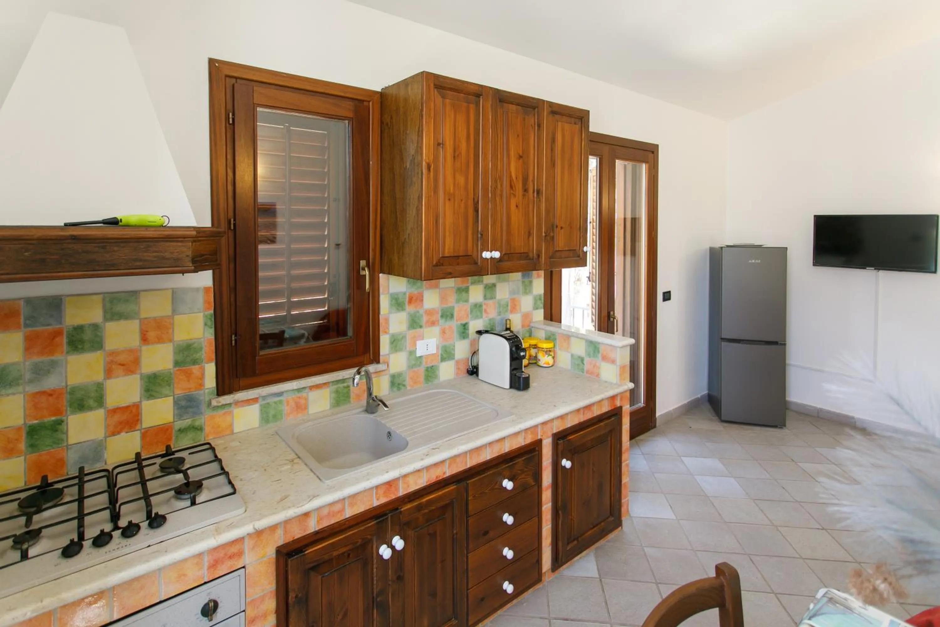 kitchen in SanVitoTour- Residence Il Baglio