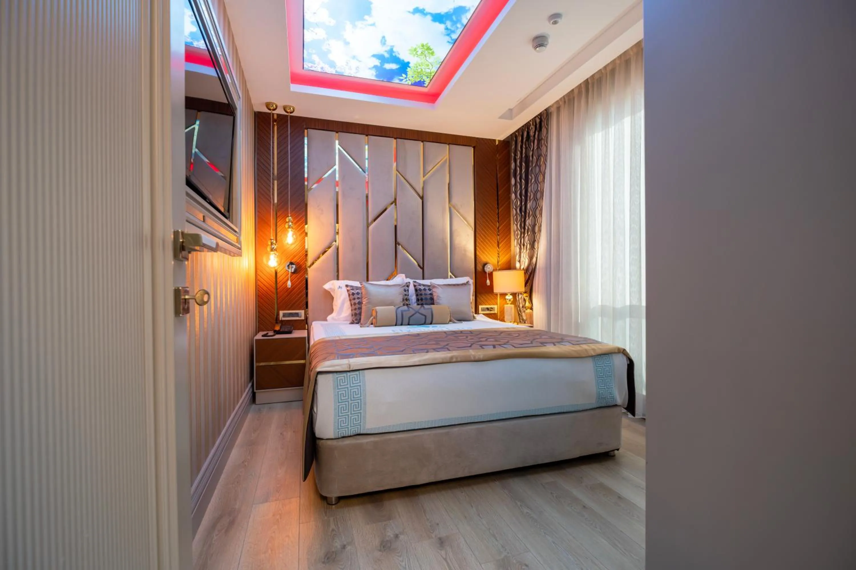 Bed in Elysium Deluxe Suites Antalya