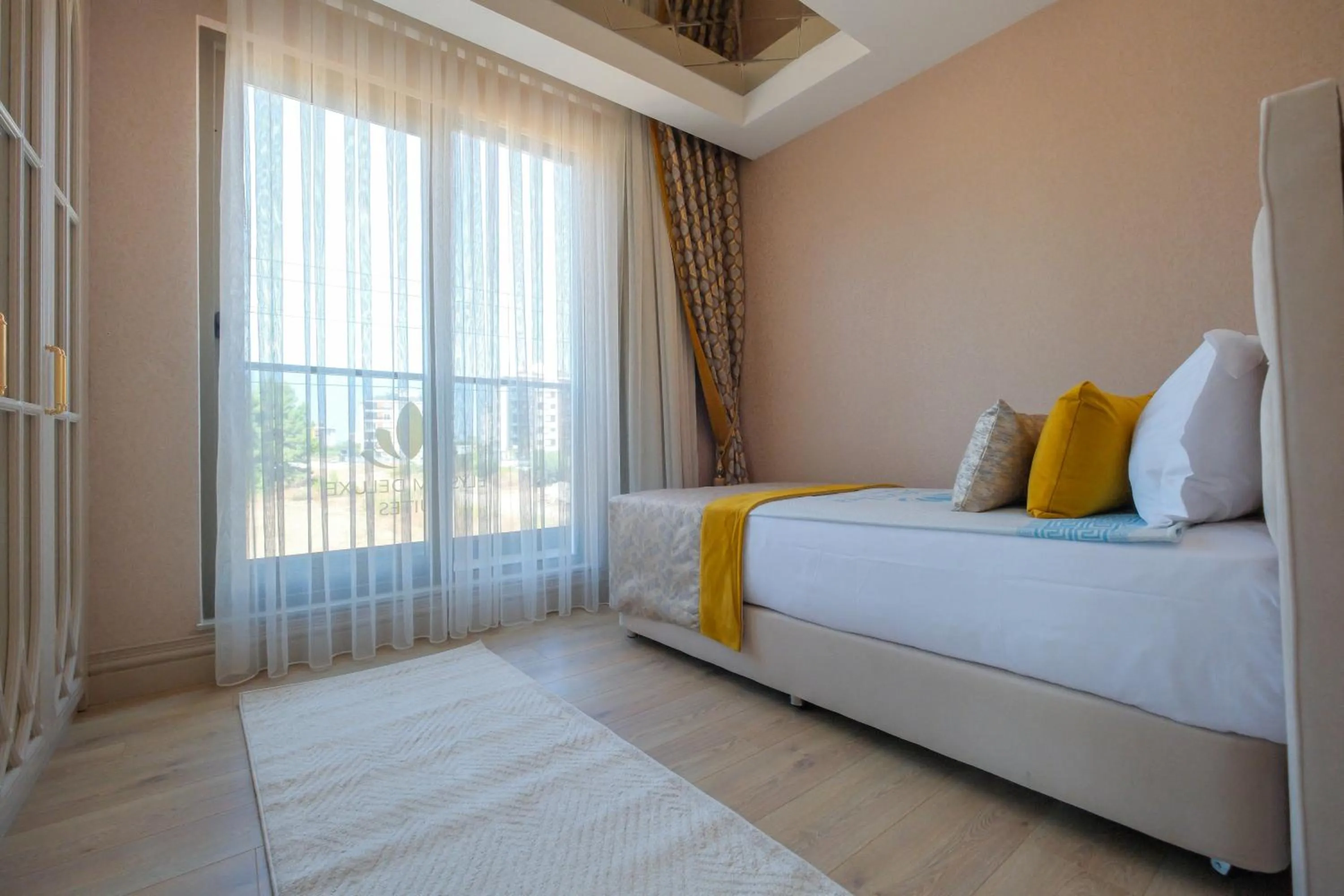 Bed in Elysium Deluxe Suites Antalya