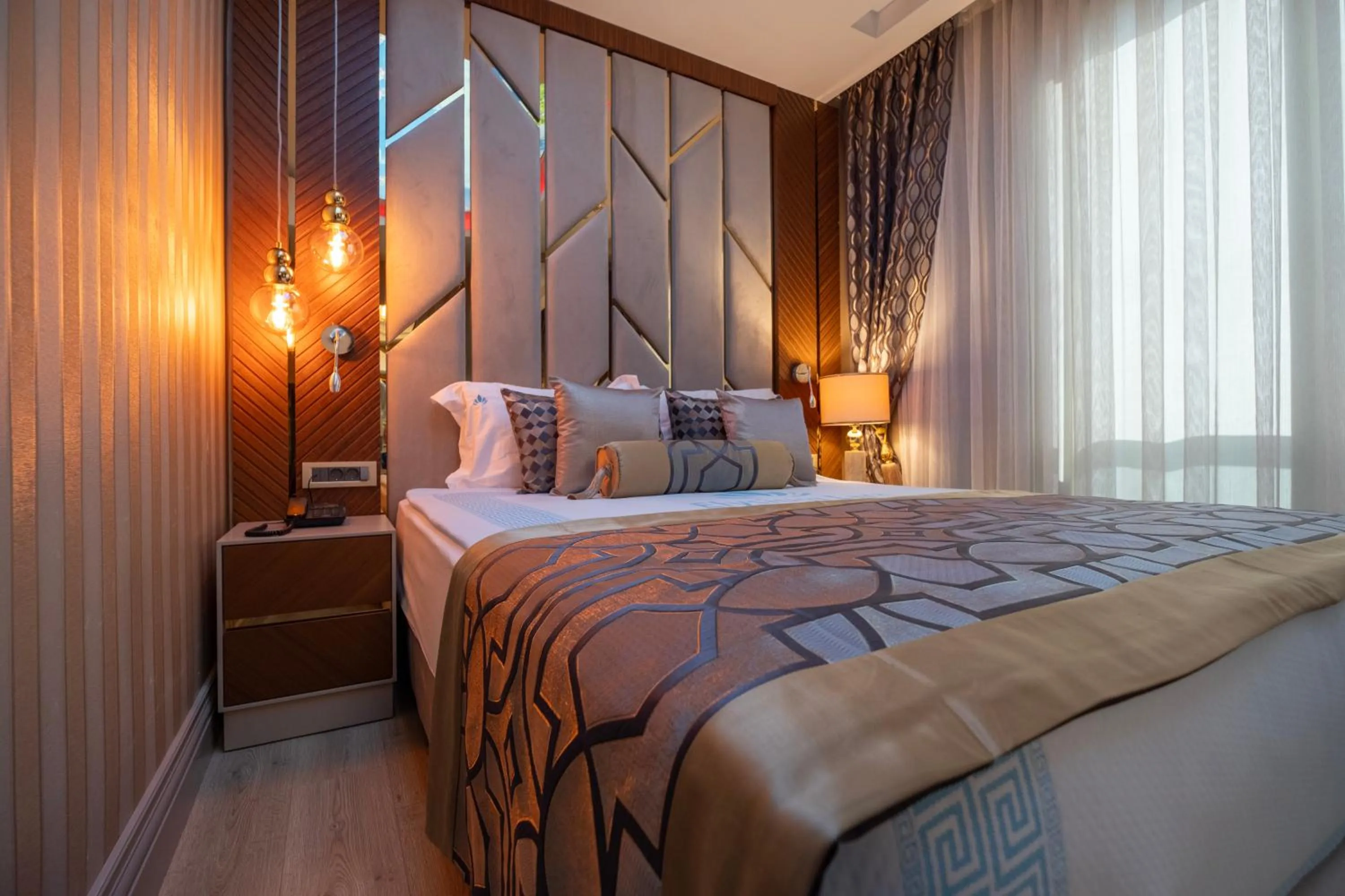 Bed in Elysium Deluxe Suites Antalya