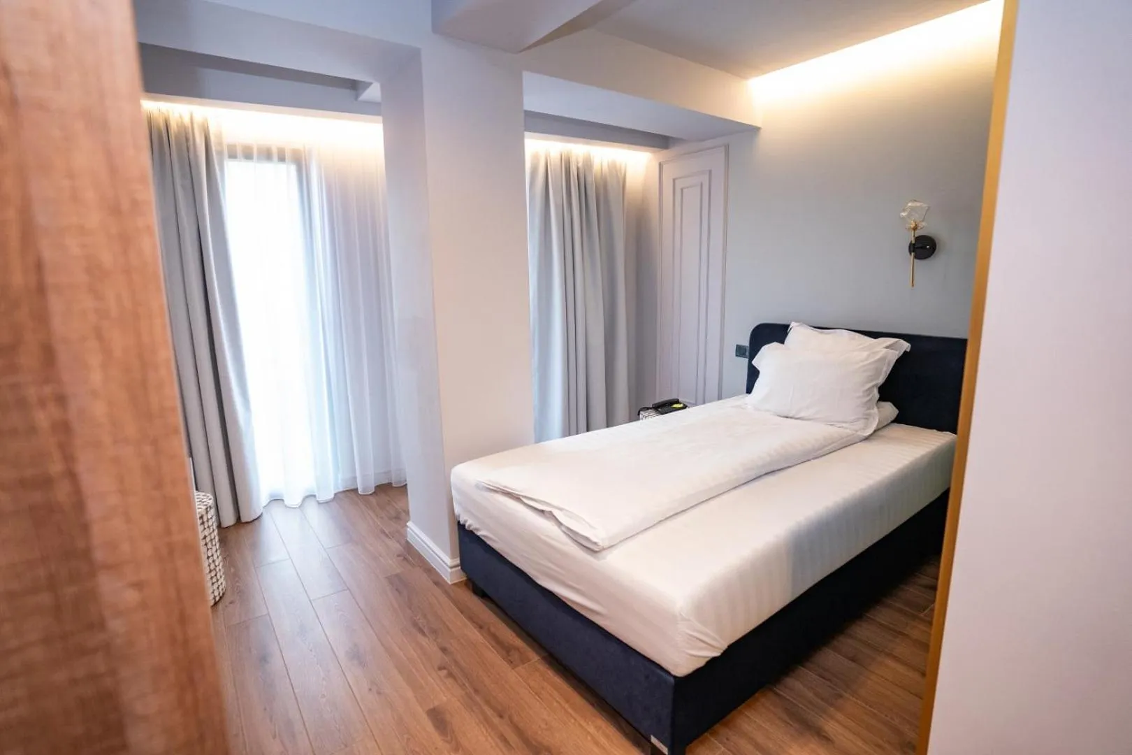 Photo of the whole room, Bed in Cosmopolita Boutique Hotel