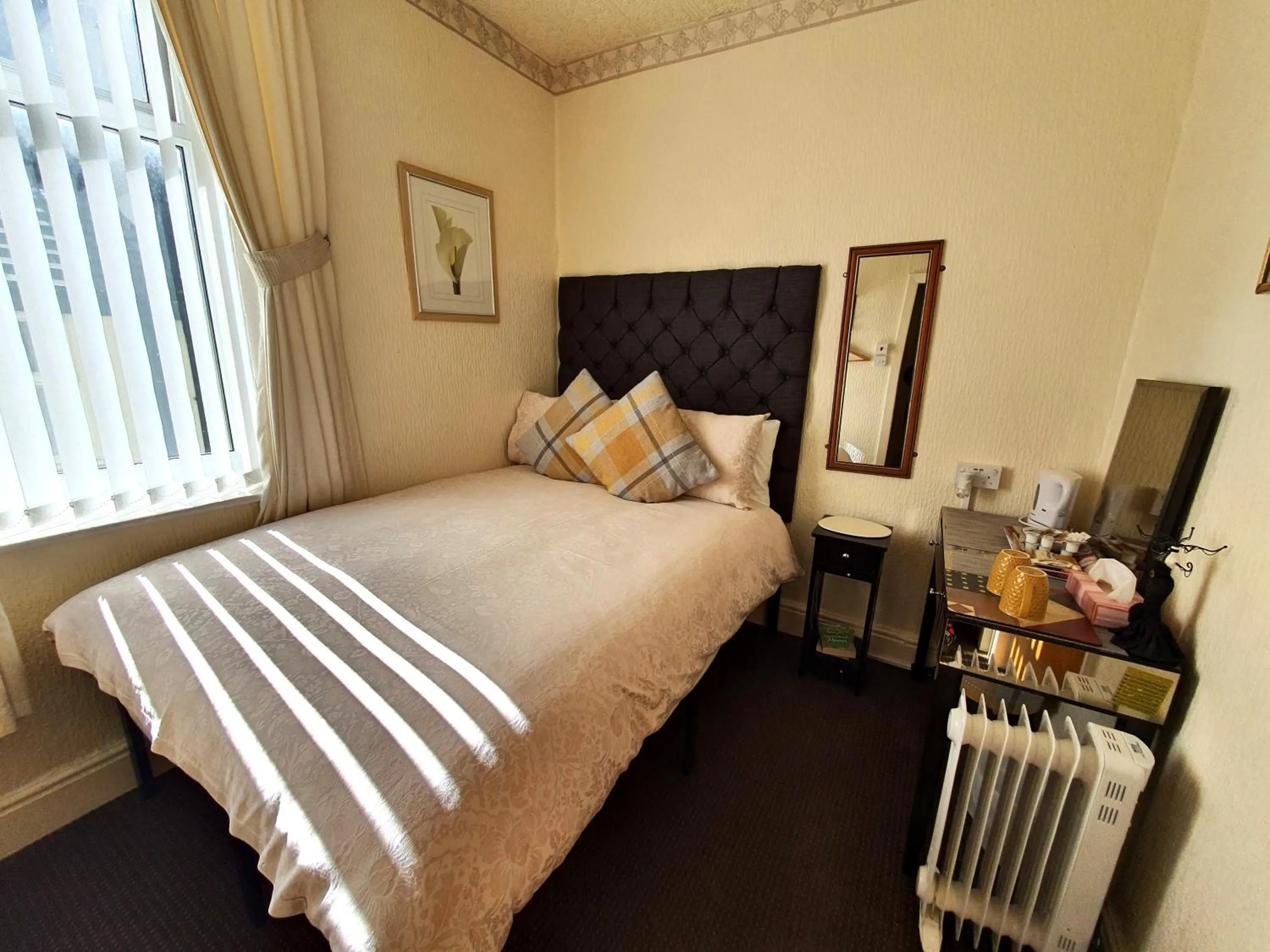 Bed in Windsor House Hotel