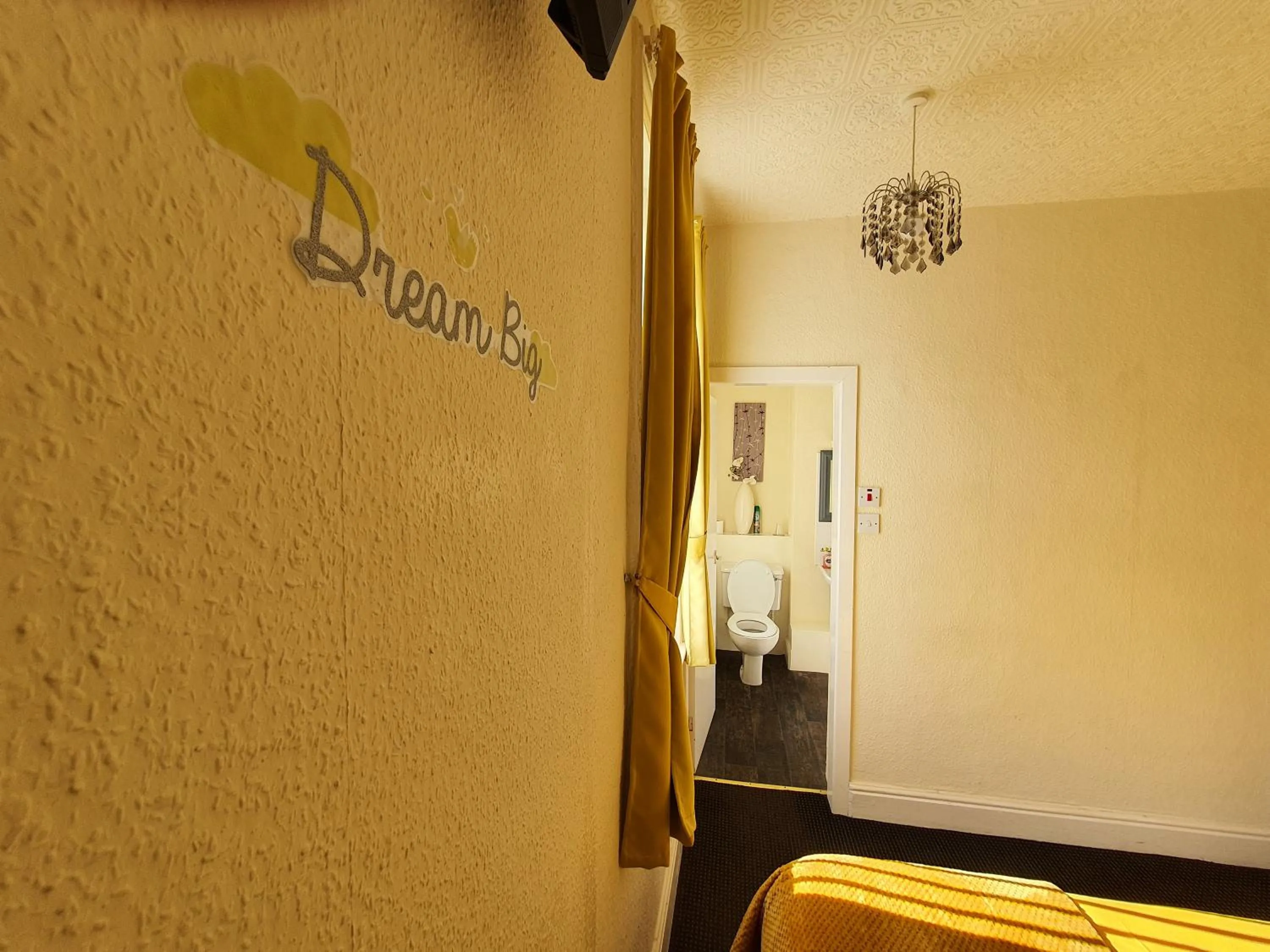 Bedroom in Windsor House Hotel