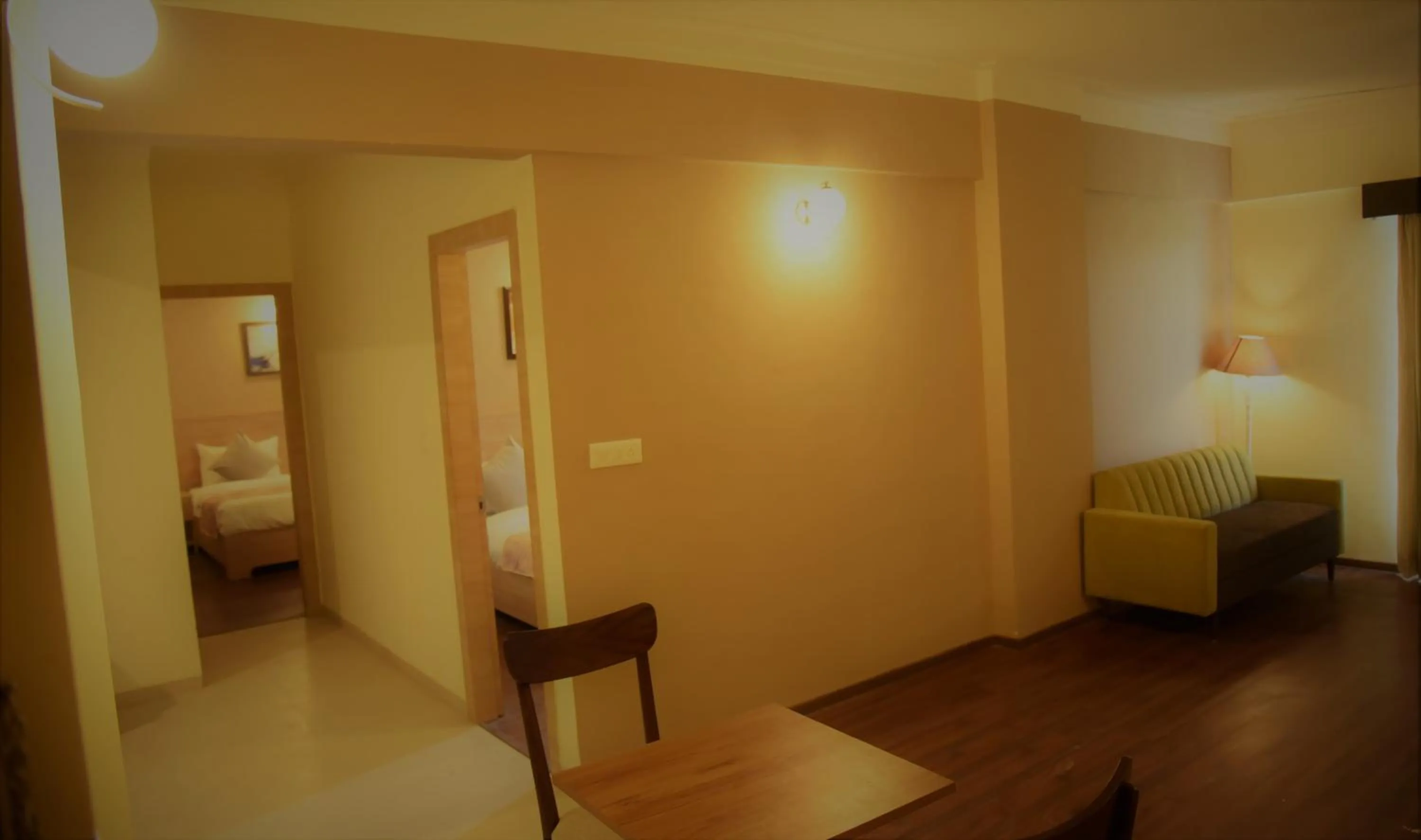 Living room, Bed in Starlit Suites Shirdi