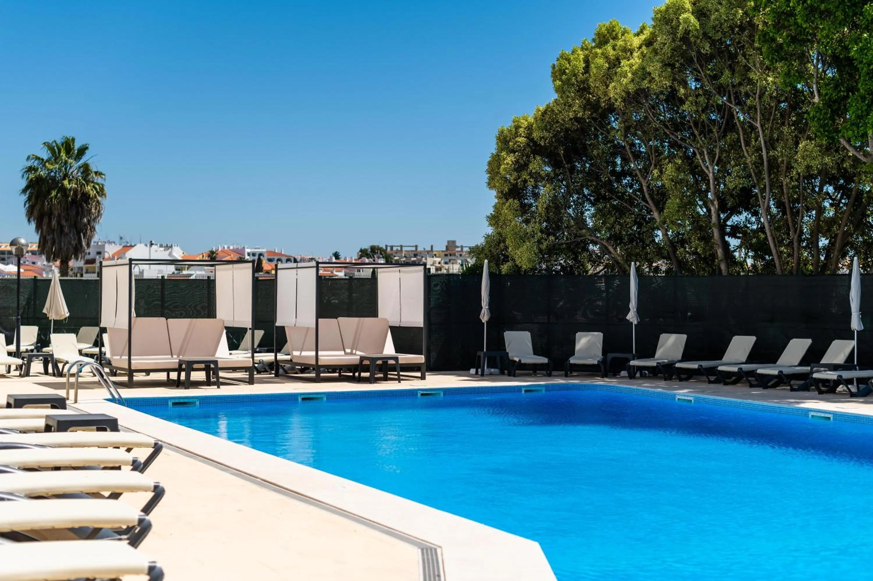 Swimming pool in Emeralds Albufeira by DK Stays