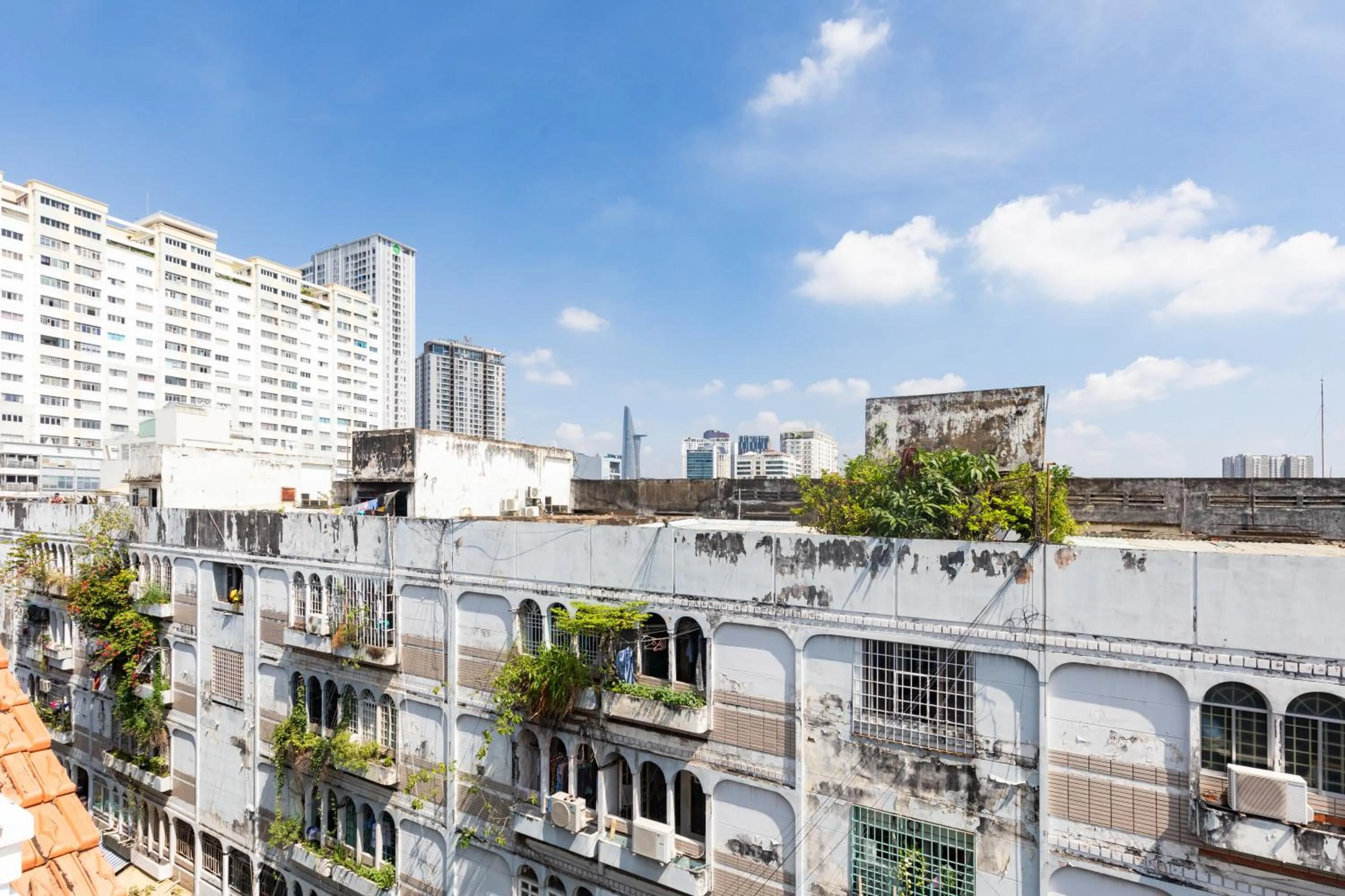 Property building in Saigon Authentic Hostel - Local Vibes, City Tours, Cooking Dinner, Evening Streetfood, Free Menu Breakfast, Gym & Rooftop