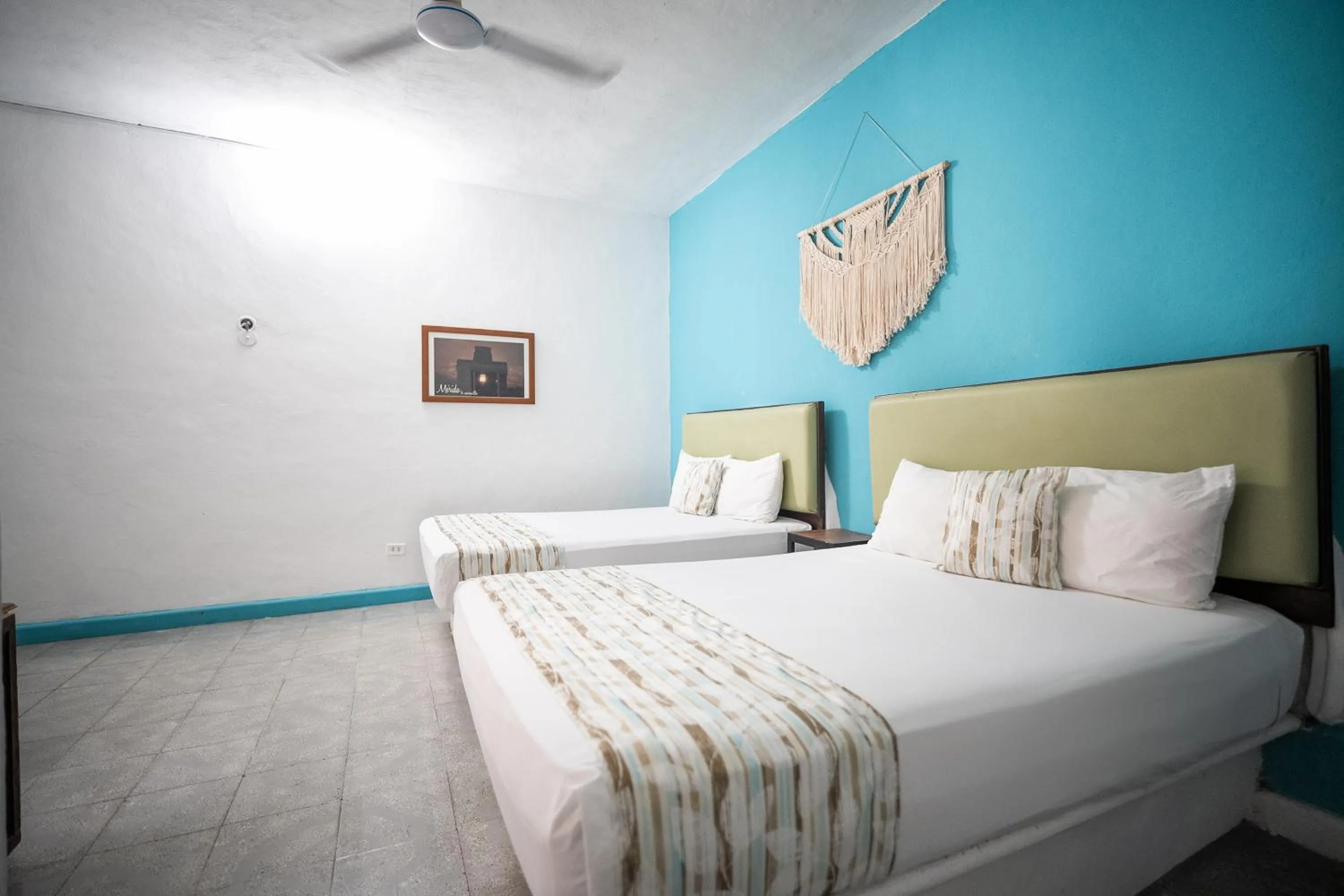 Bed in Hotel Posada Aurora