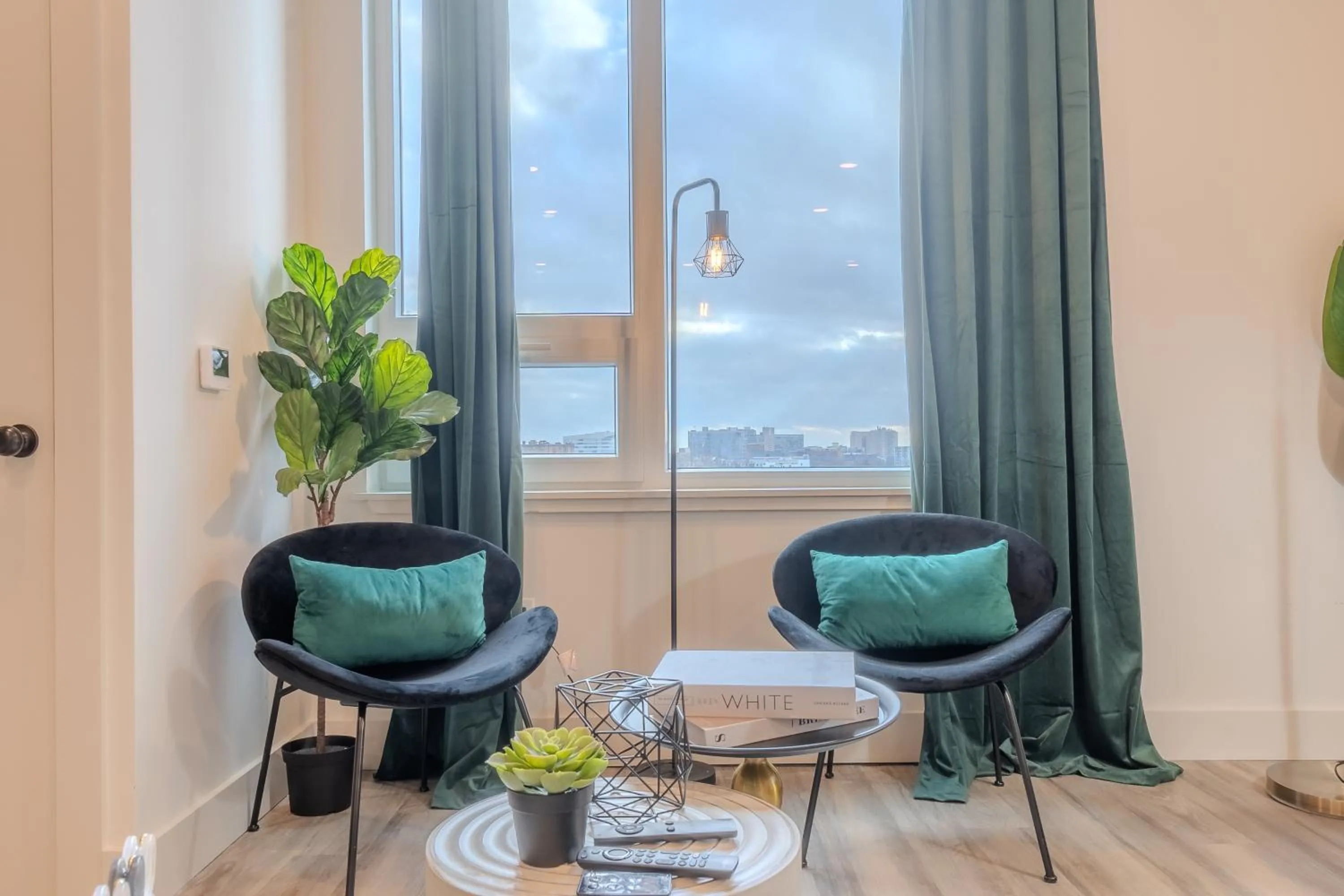 Living room in Emerald Escape, Free Parking, 2 Bath, Sleeps 8 Near American Dream and The Airport, King Bed and 2 Queen Beds, Washer and Dryer