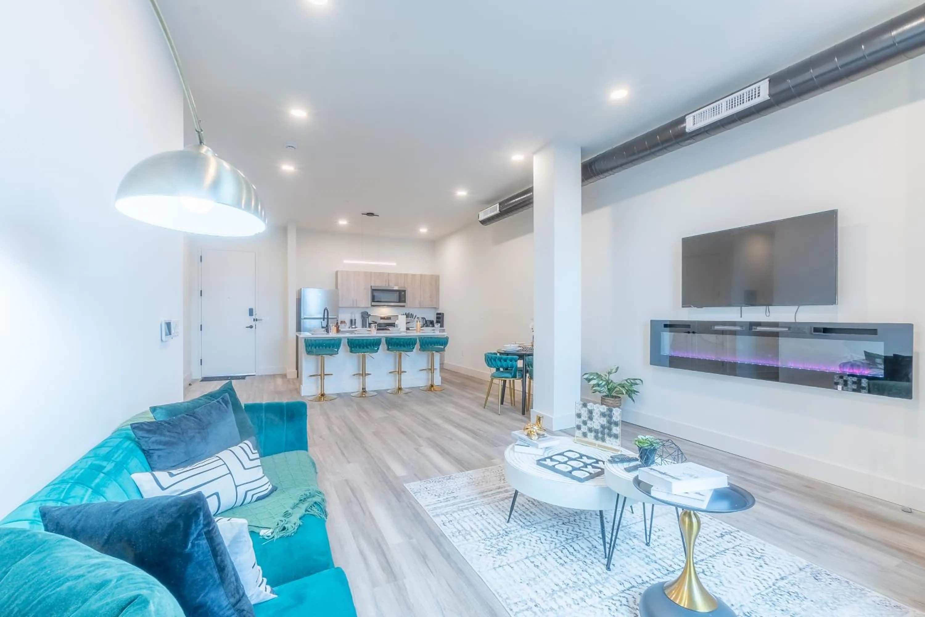 Communal lounge/ TV room in Emerald Escape, Free Parking, 2 Bath, Sleeps 8 Near American Dream and The Airport, King Bed and 2 Queen Beds, Washer and Dryer