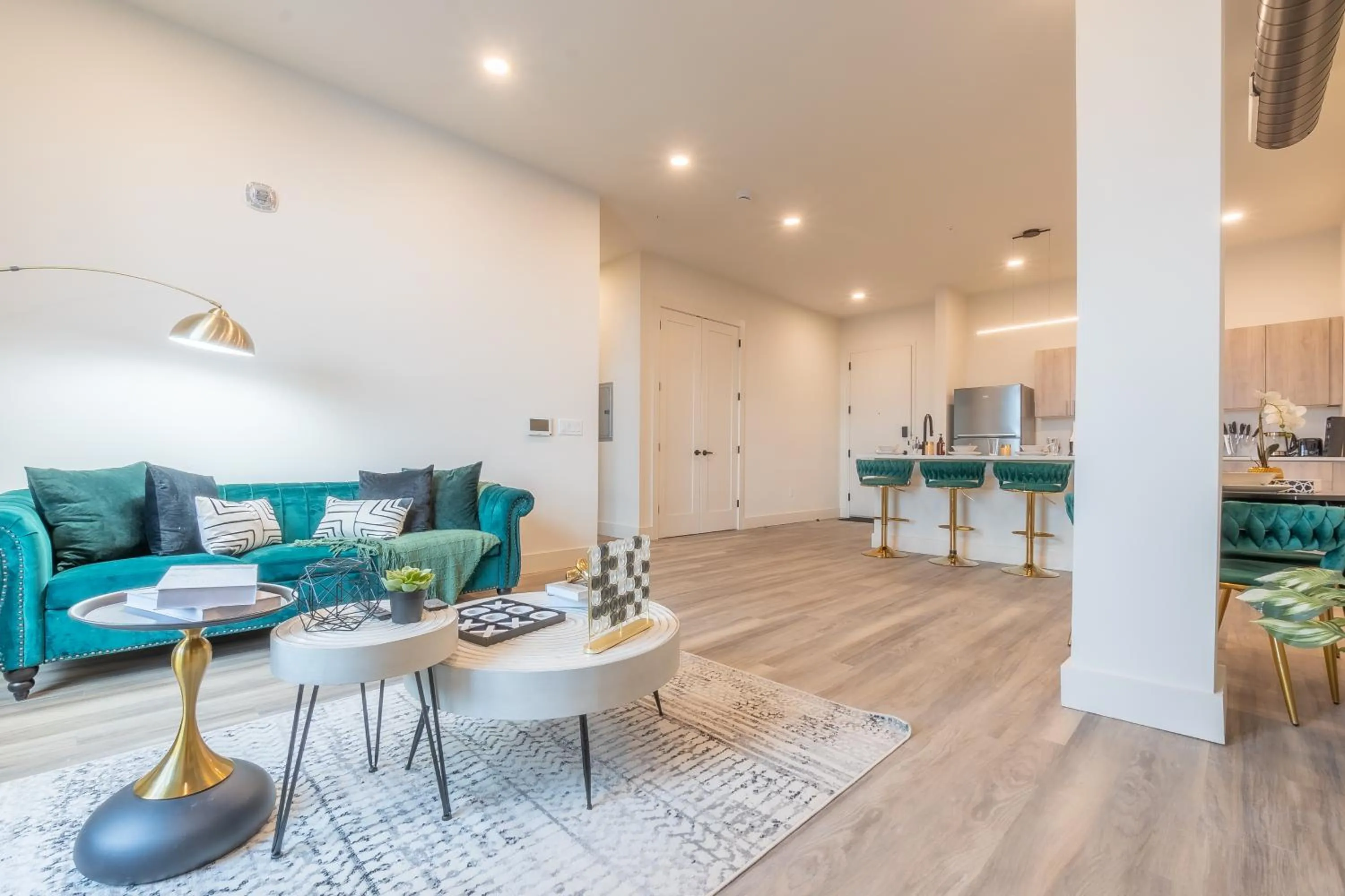 Living room in Emerald Escape, Free Parking, 2 Bath, Sleeps 8 Near American Dream and The Airport, King Bed and 2 Queen Beds, Washer and Dryer