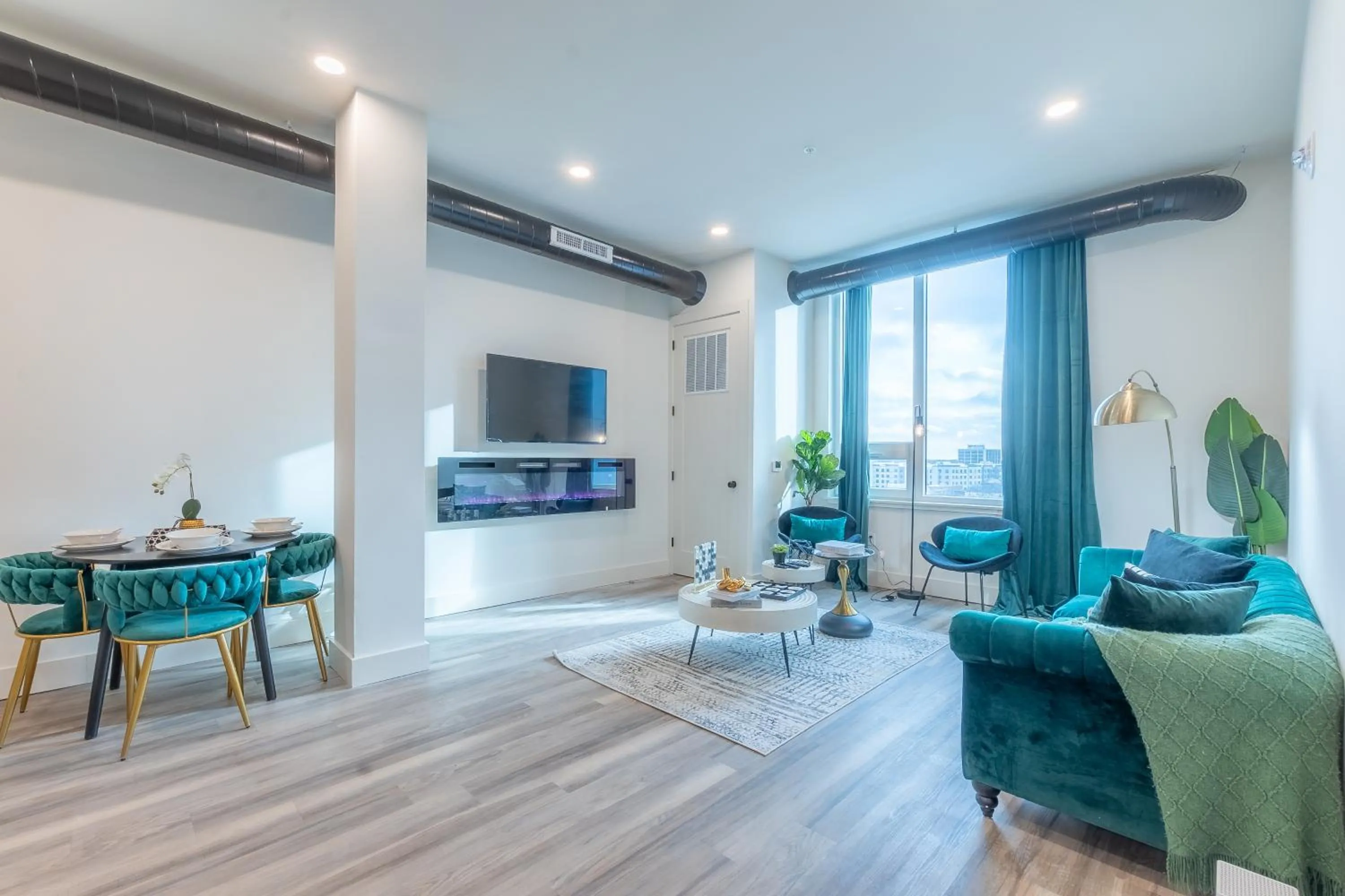 Communal lounge/ TV room in Emerald Escape, Free Parking, 2 Bath, Sleeps 8 Near American Dream and The Airport, King Bed and 2 Queen Beds, Washer and Dryer