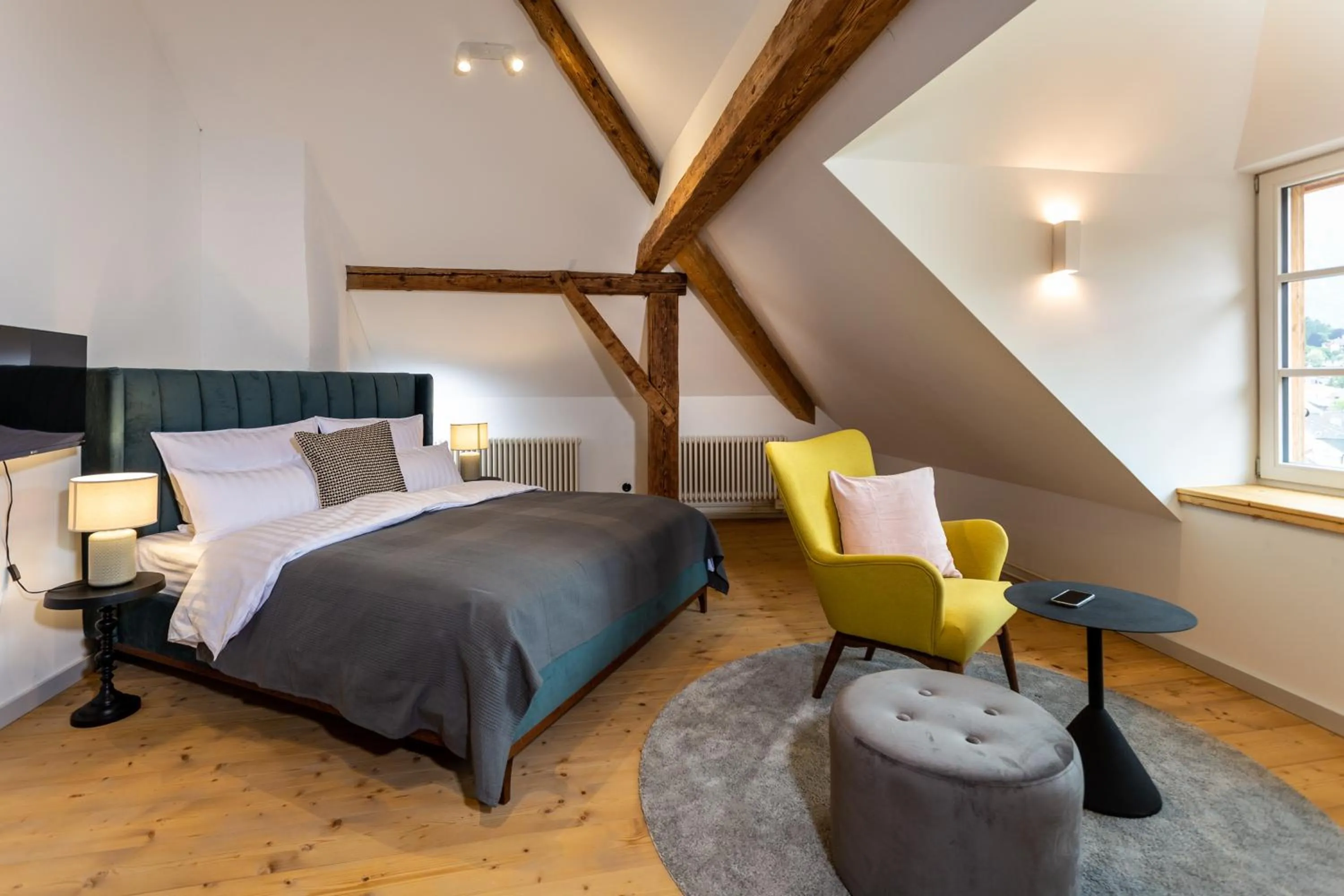 Seating area, Bed in Podenhaus