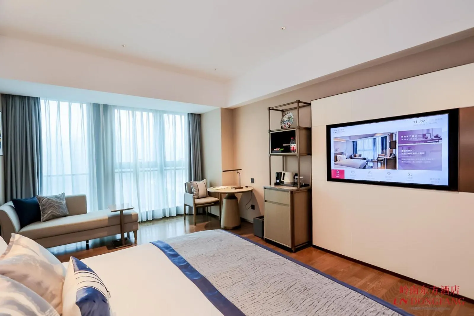 Photo of the whole room, Bed in Guangzhou Pazhou LN DongFang Hotel