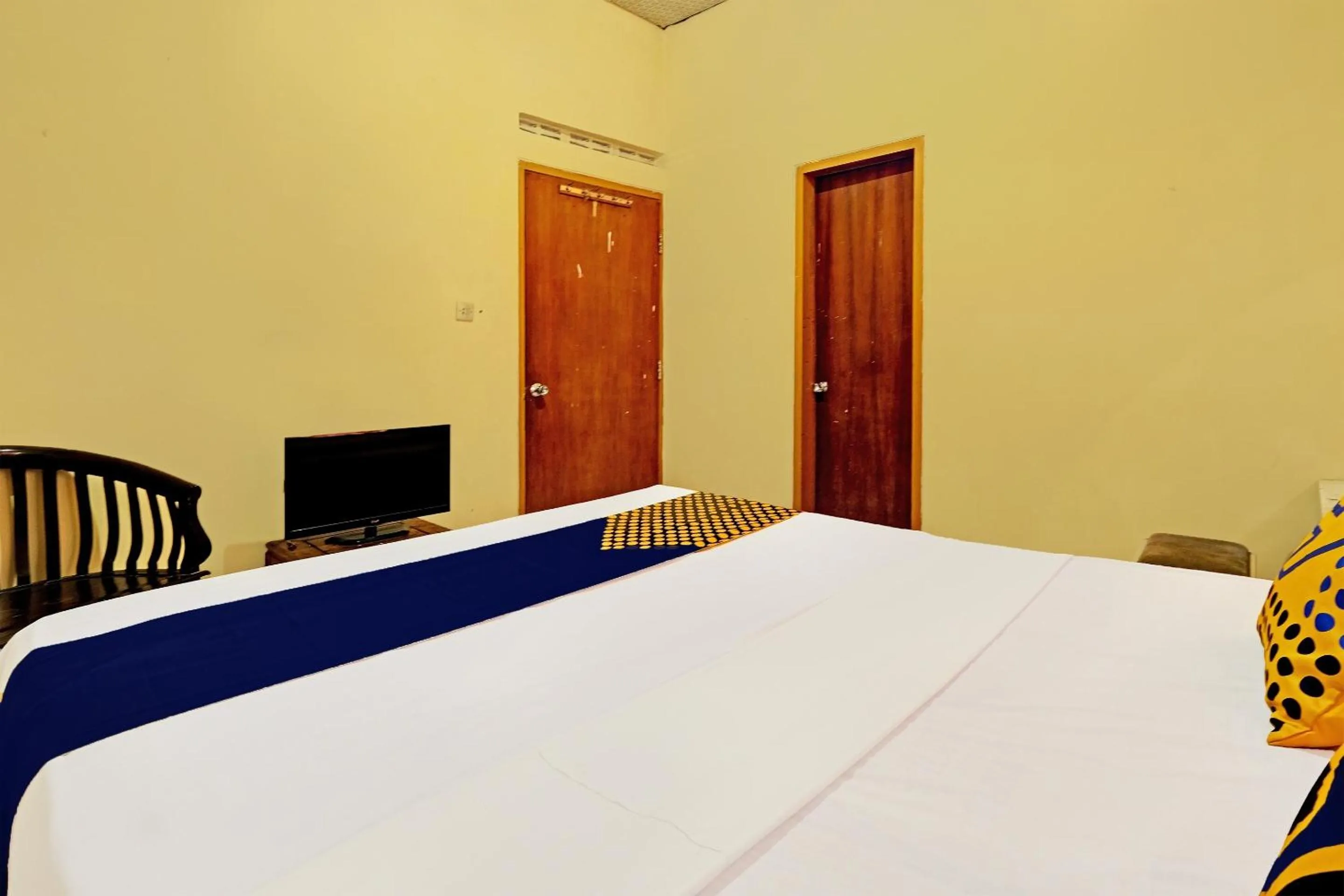 Bedroom in SPOT ON 92408 Hotel Renata 2