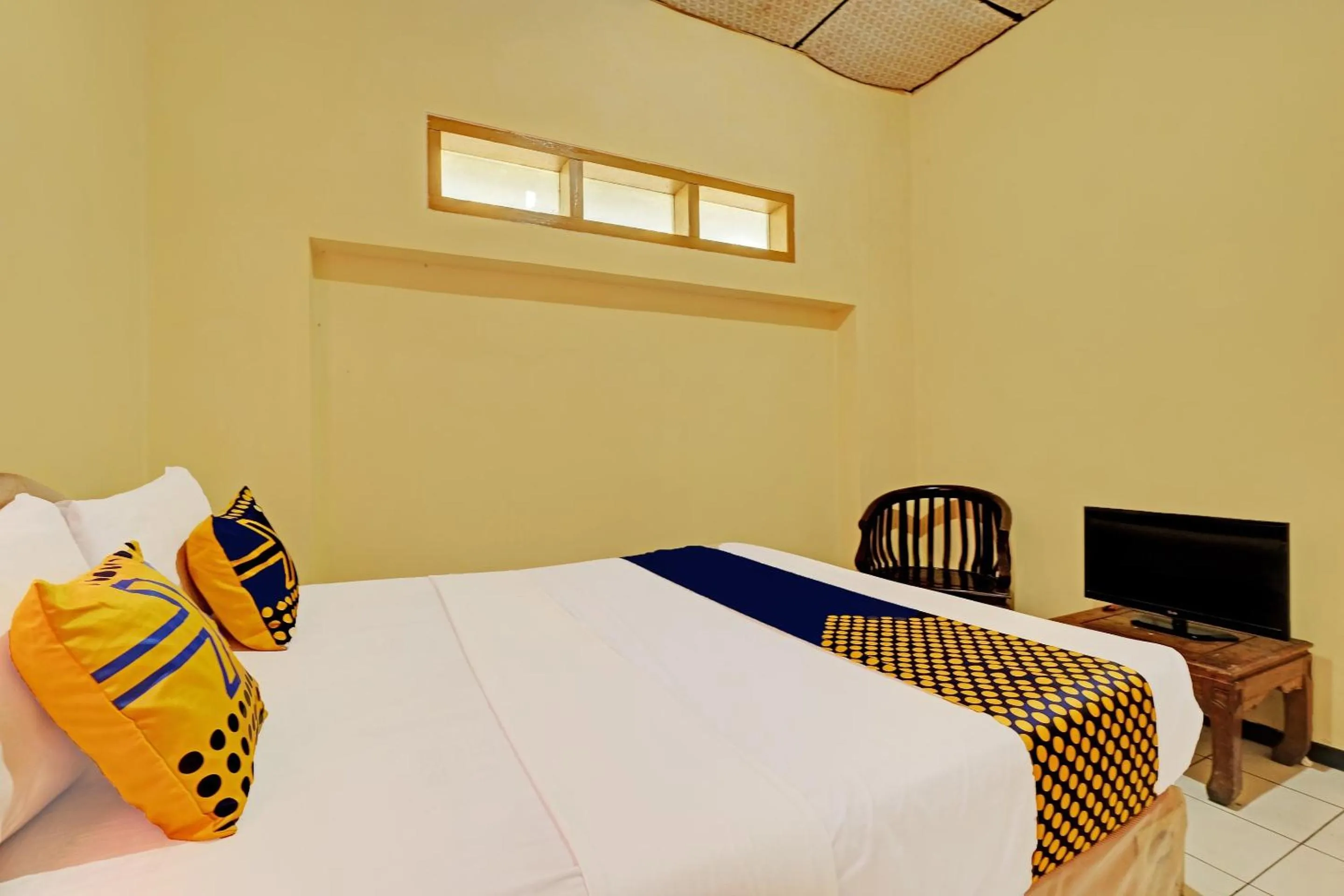 Bedroom in SPOT ON 92408 Hotel Renata 2