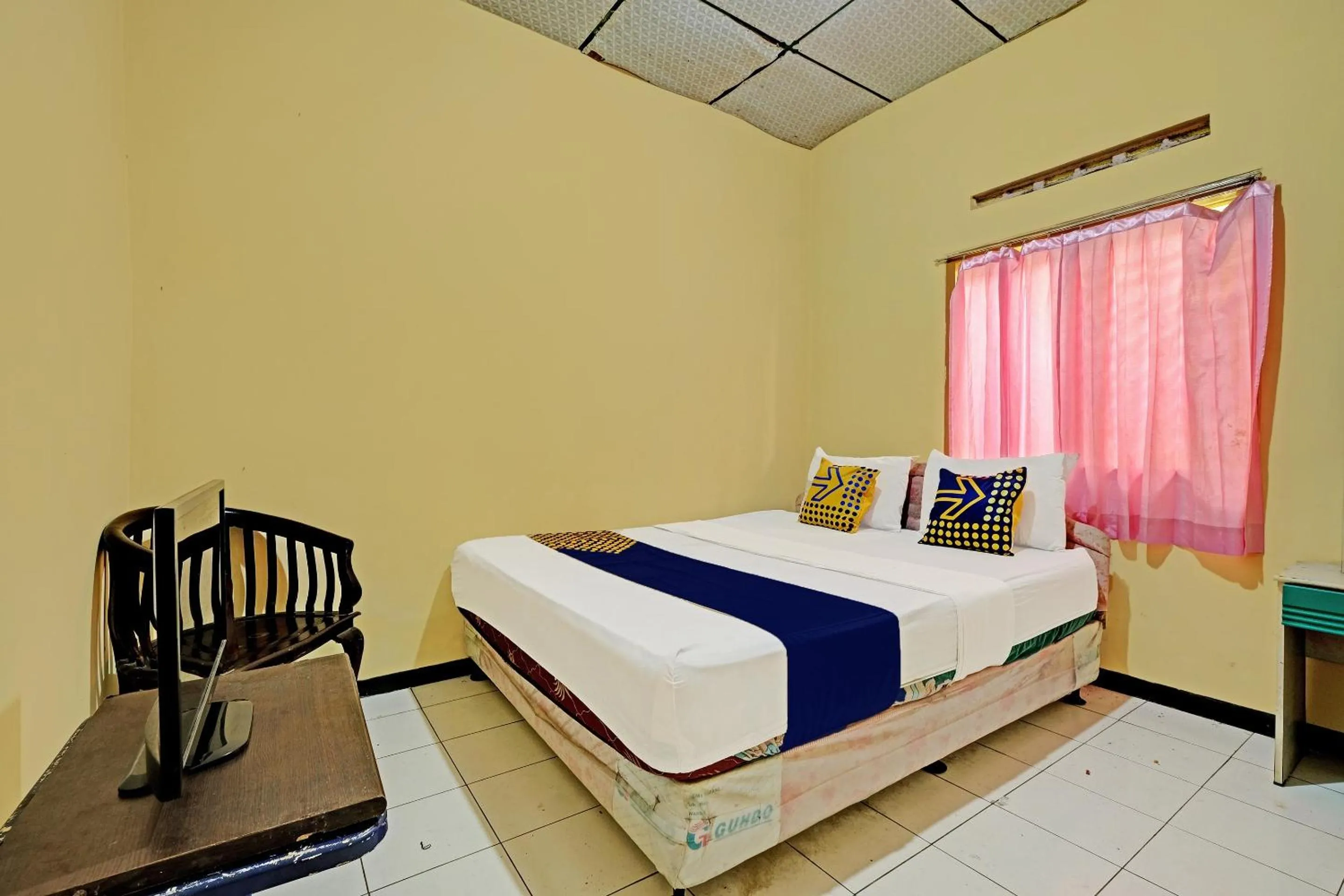 Bedroom in SPOT ON 92408 Hotel Renata 2