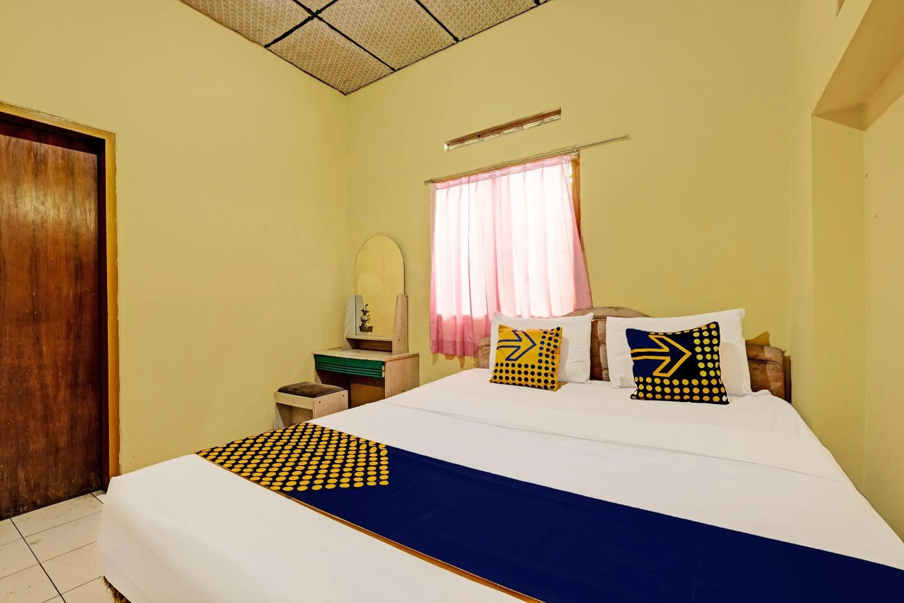 Bedroom in SPOT ON 92408 Hotel Renata 2