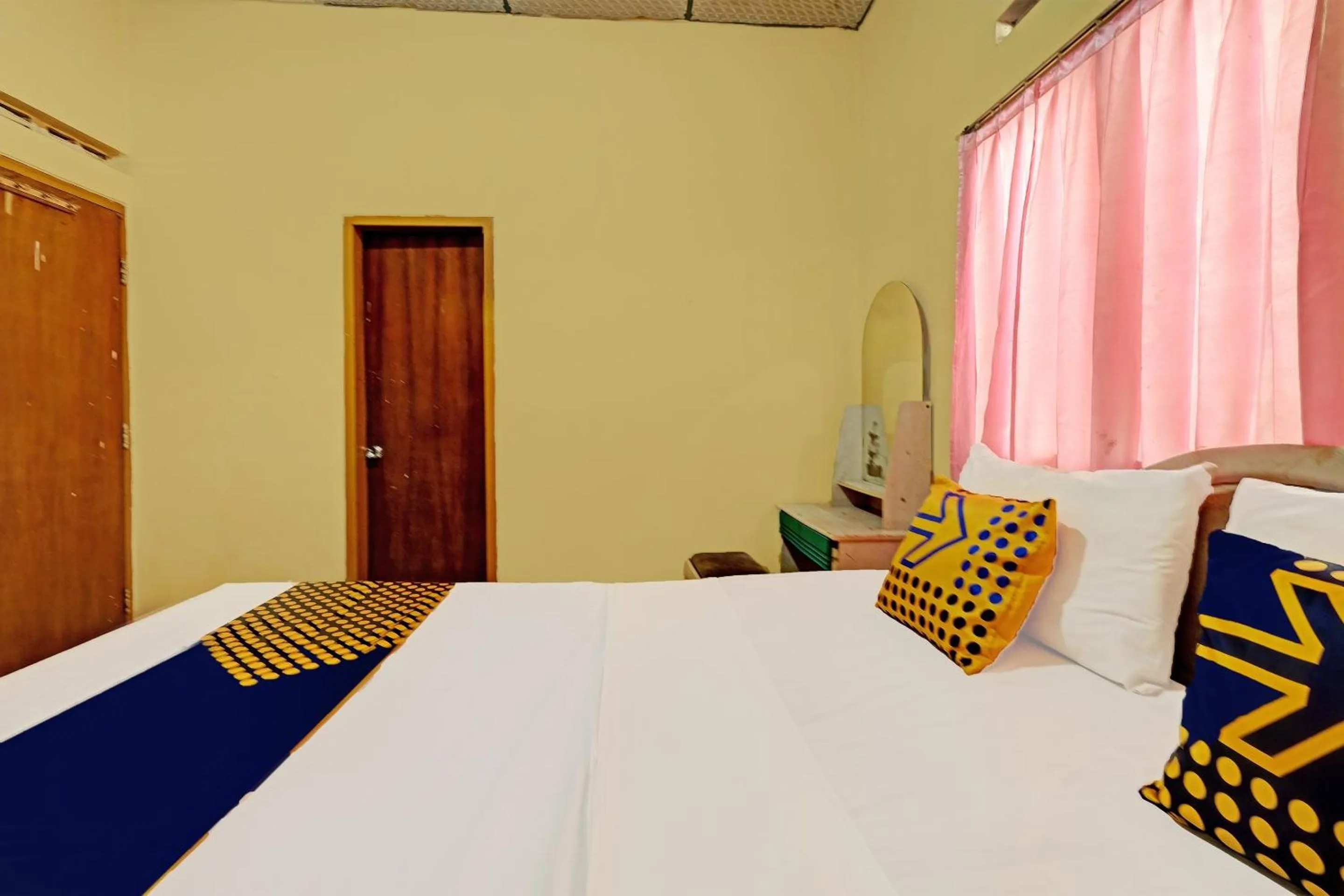 Bedroom in SPOT ON 92408 Hotel Renata 2