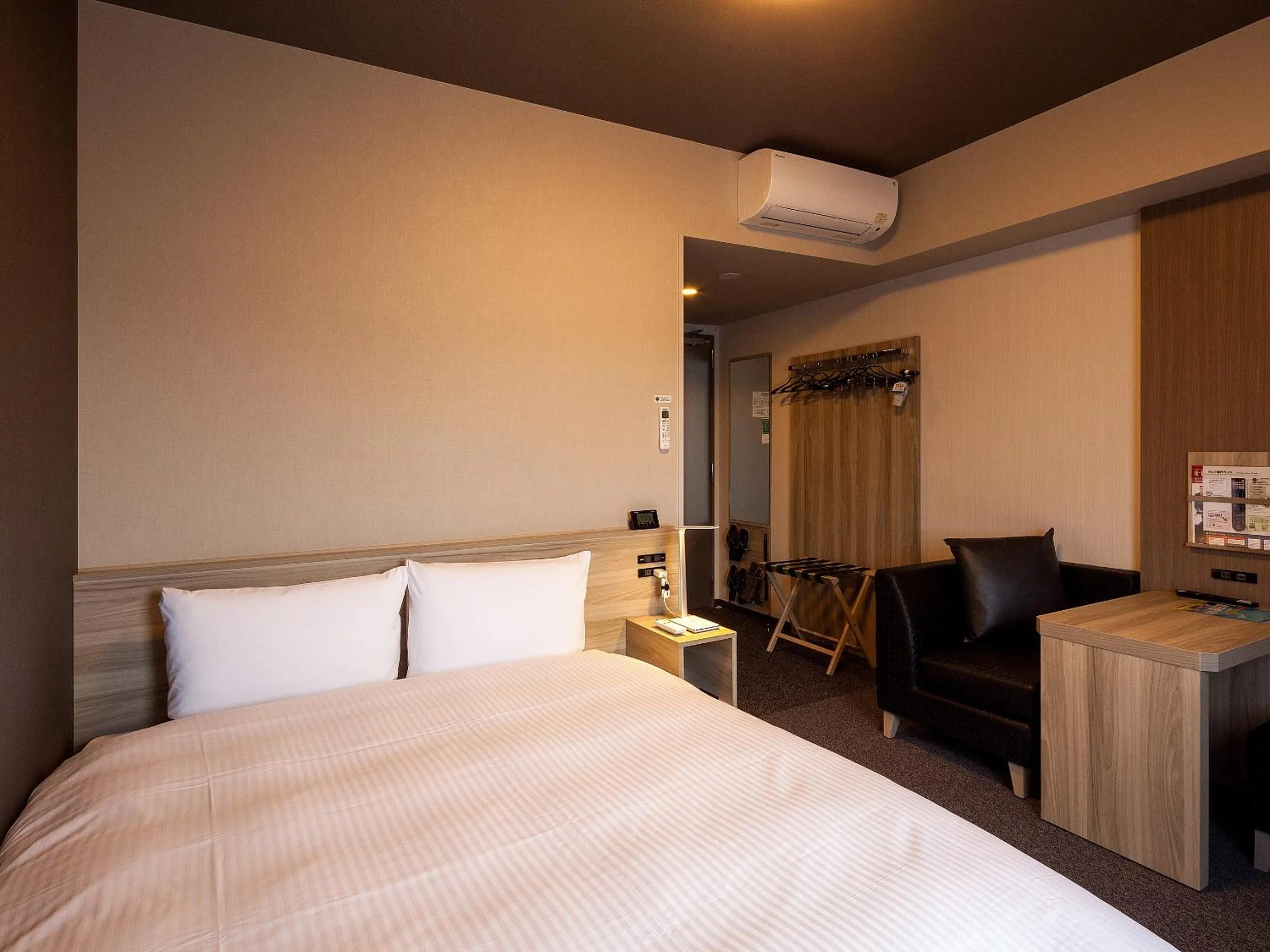 Photo of the whole room, Bed in Hotel Route Inn Miyoshi Ekimae