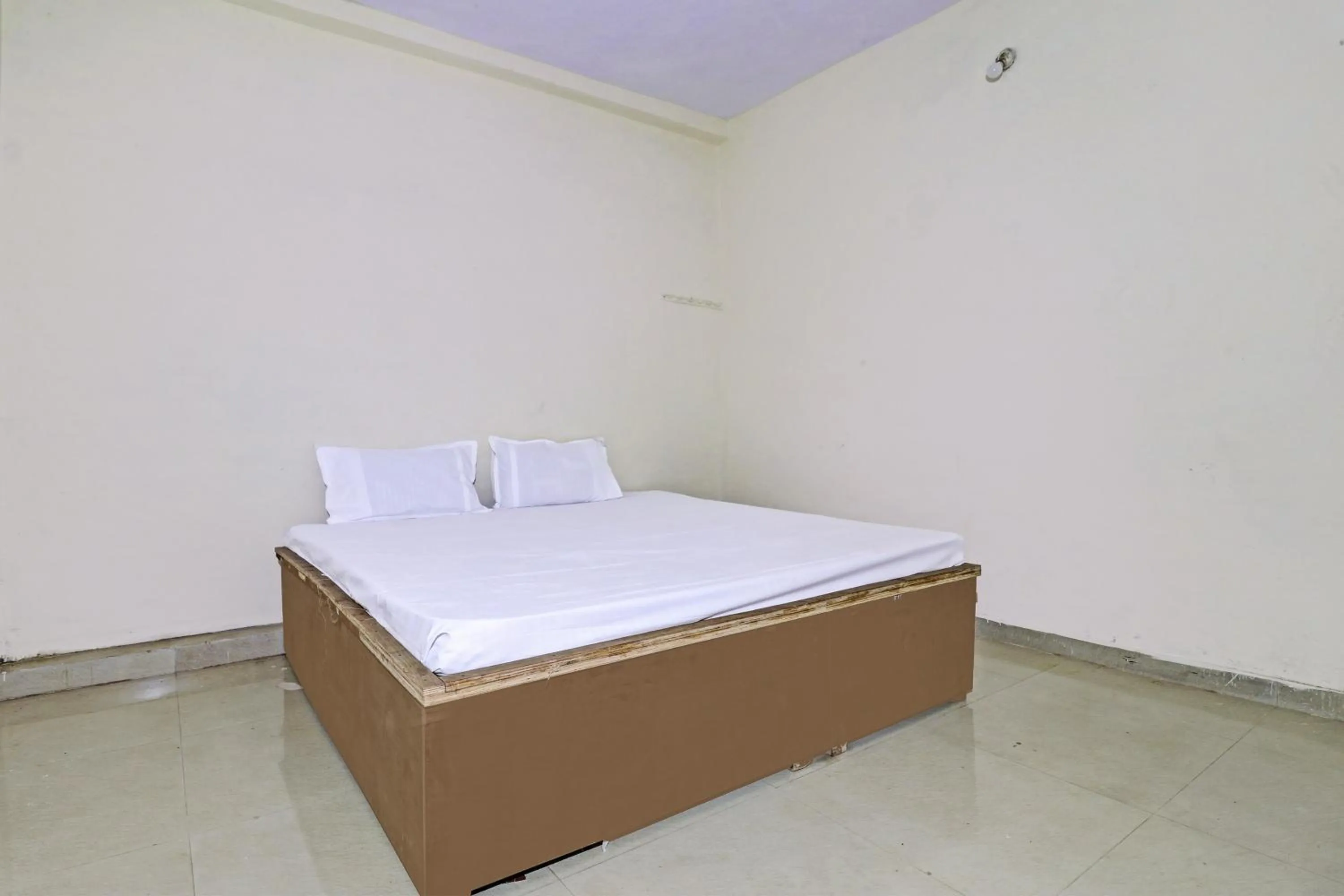 Bedroom in SPOT ON 81062 Moonlight Hotel