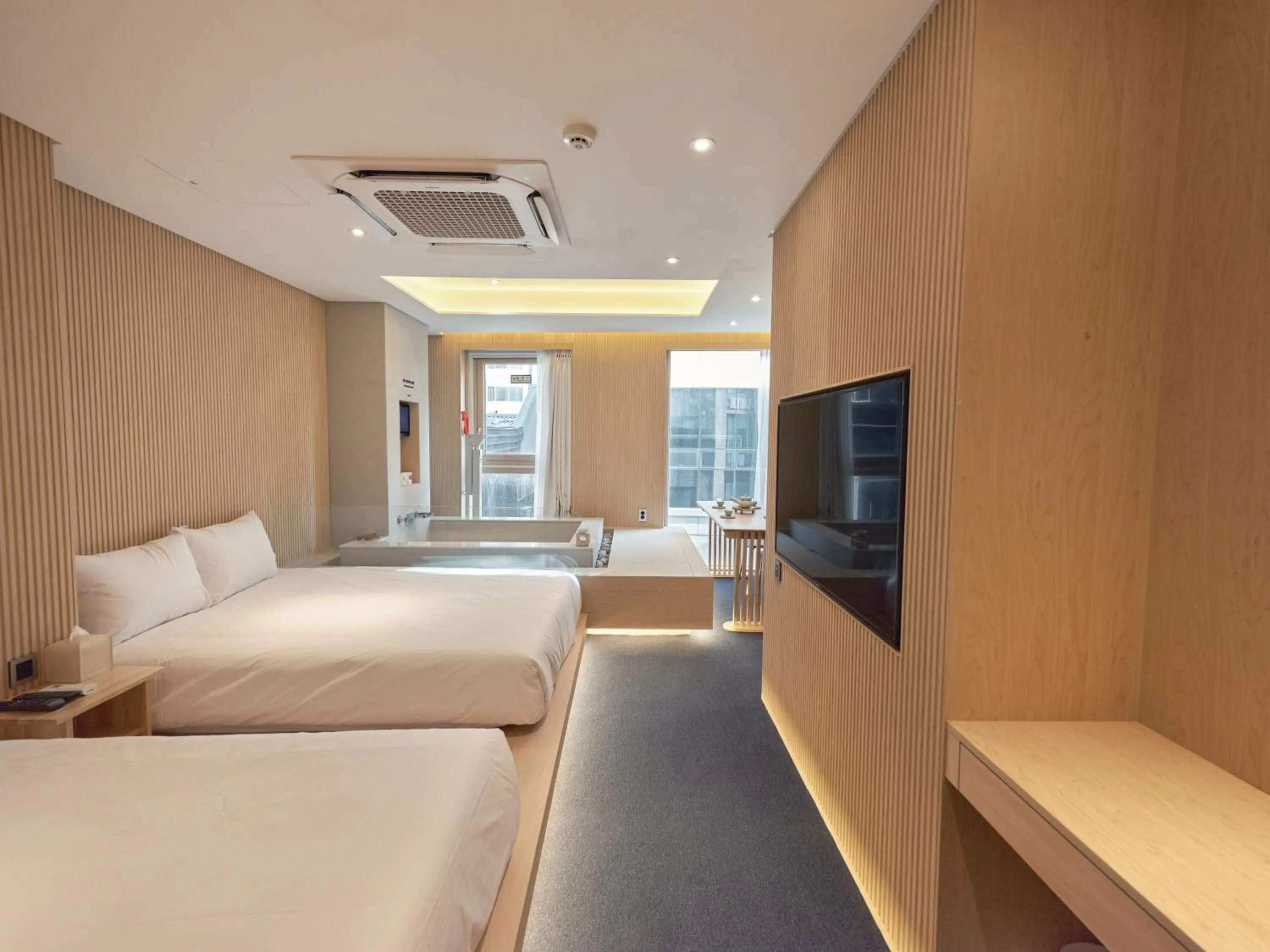 Bedroom, Bed in UH Suite Seoul Square