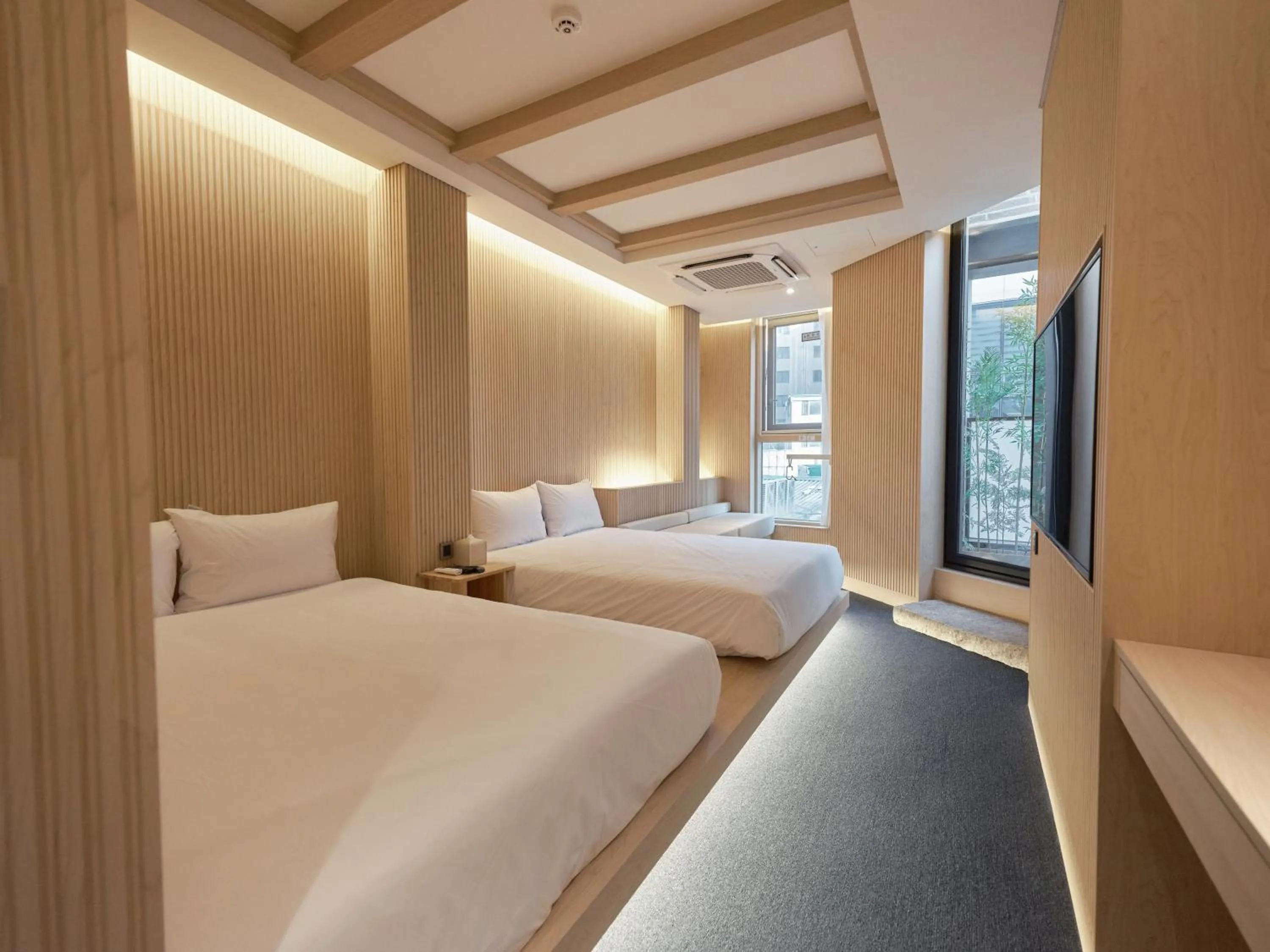 Bedroom, Bed in UH Suite Seoul Square