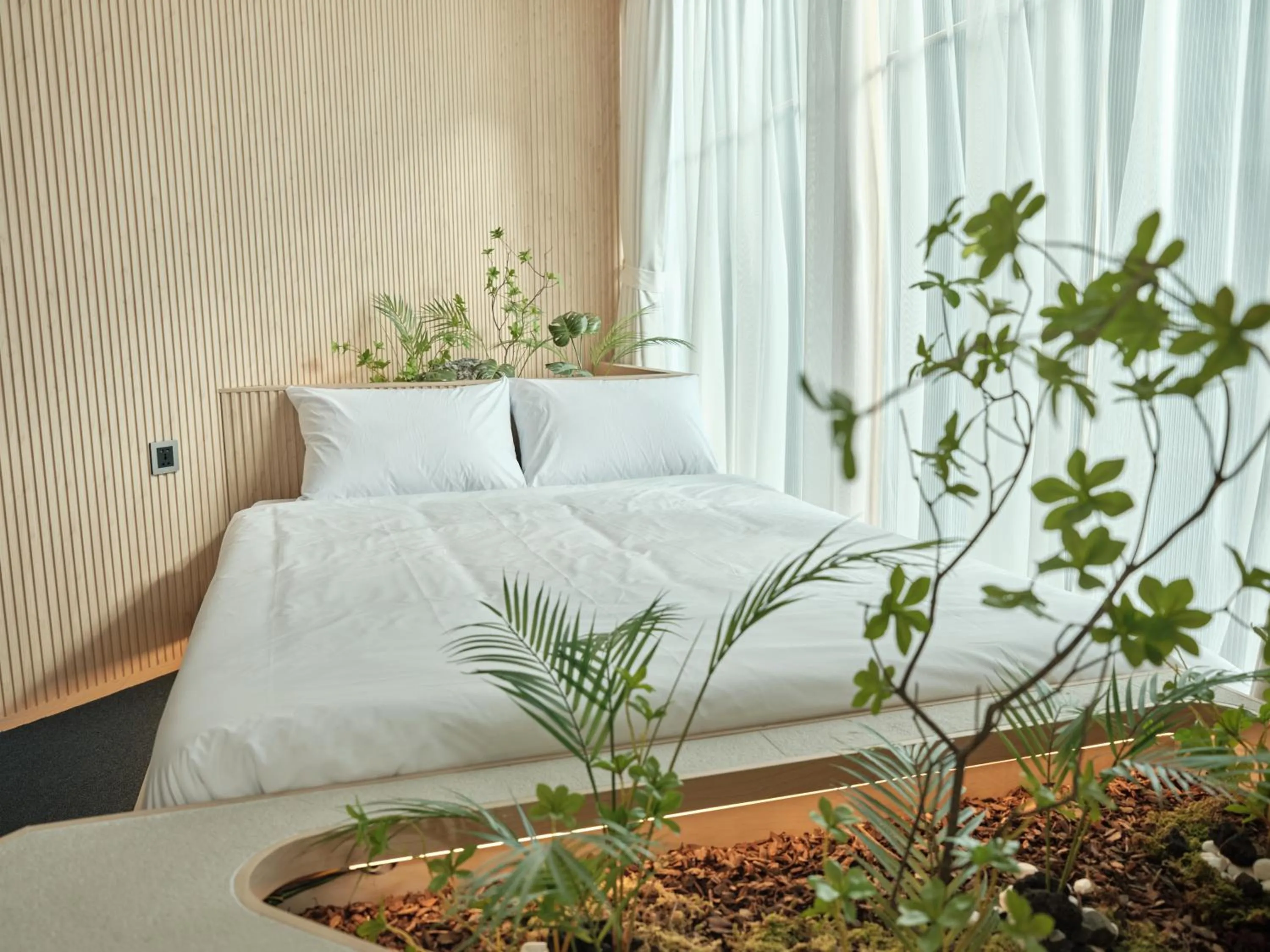 Bed in UH Suite Seoul Square