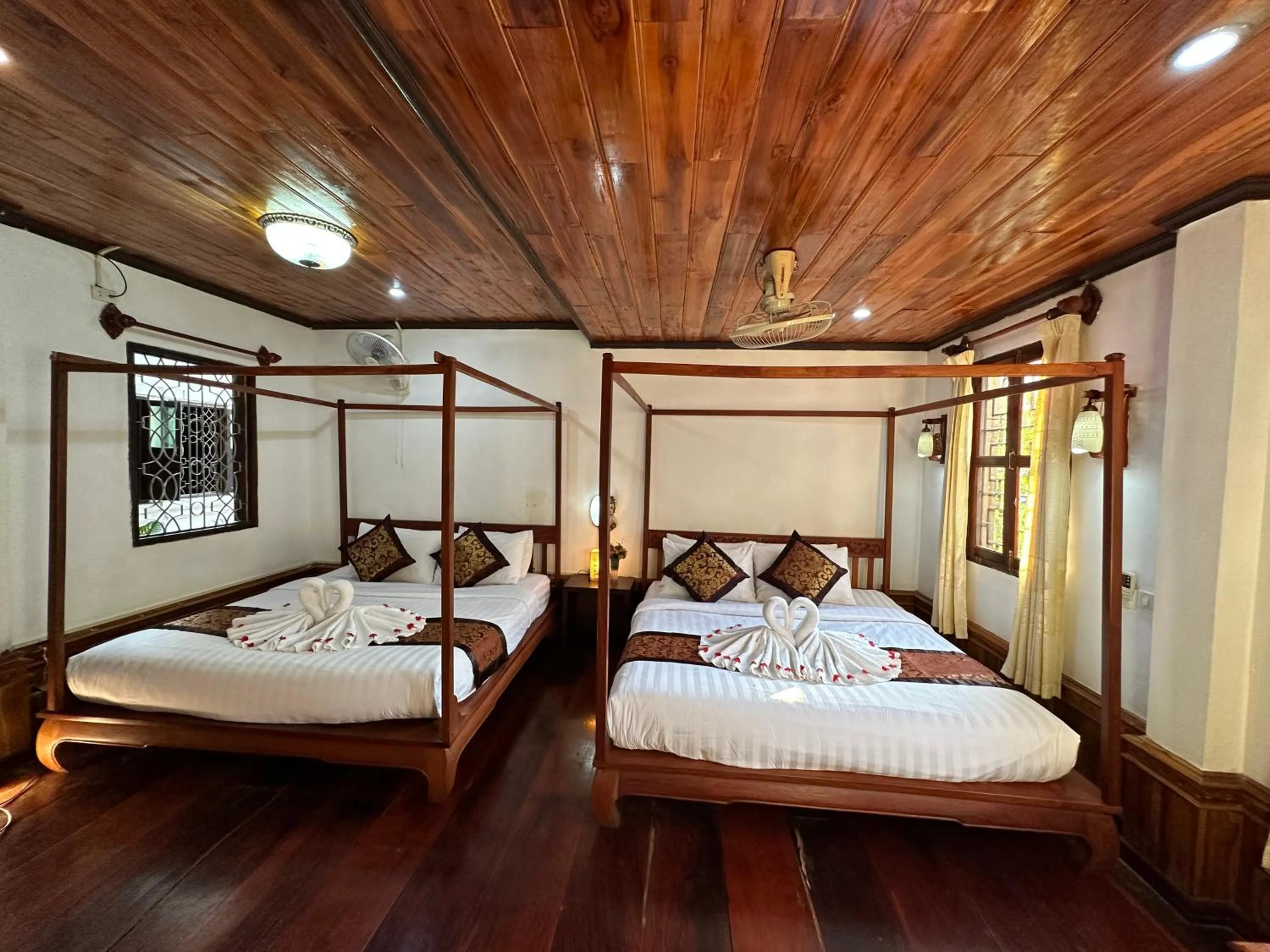 Bed in Villa Thida Mekong Riverside