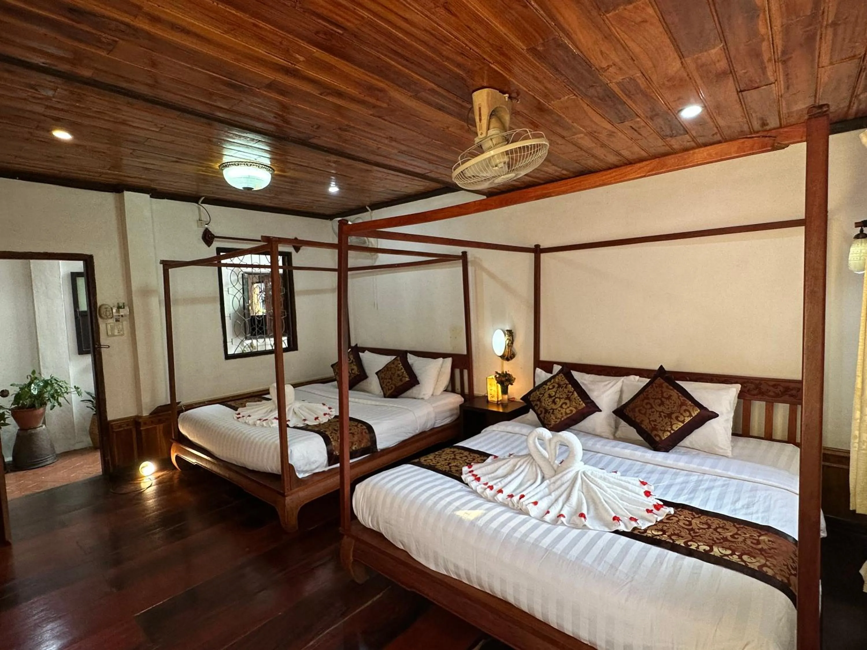 Bed in Villa Thida Mekong Riverside