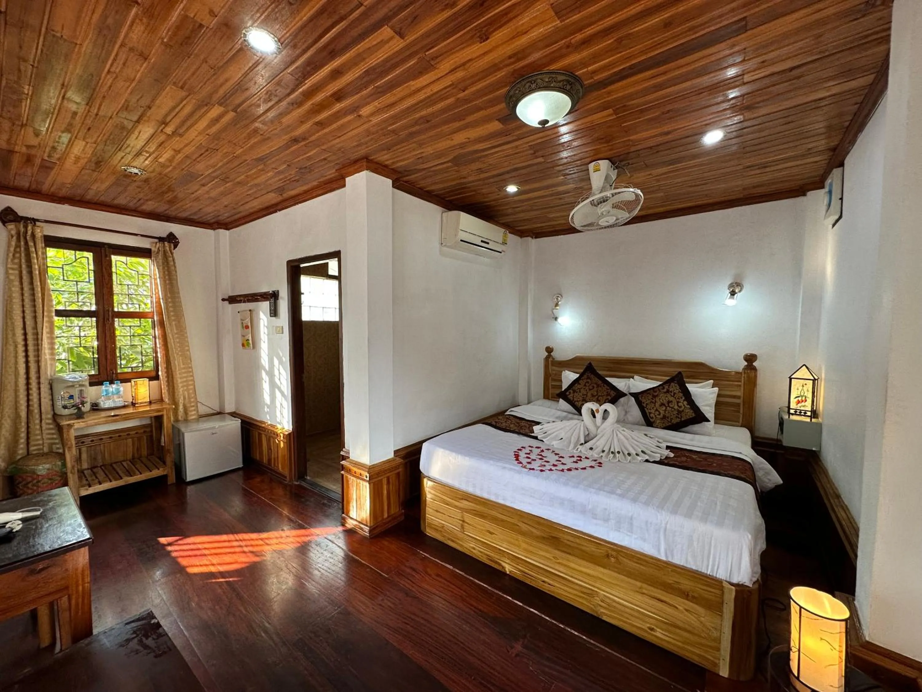 Bed in Villa Thida Mekong Riverside
