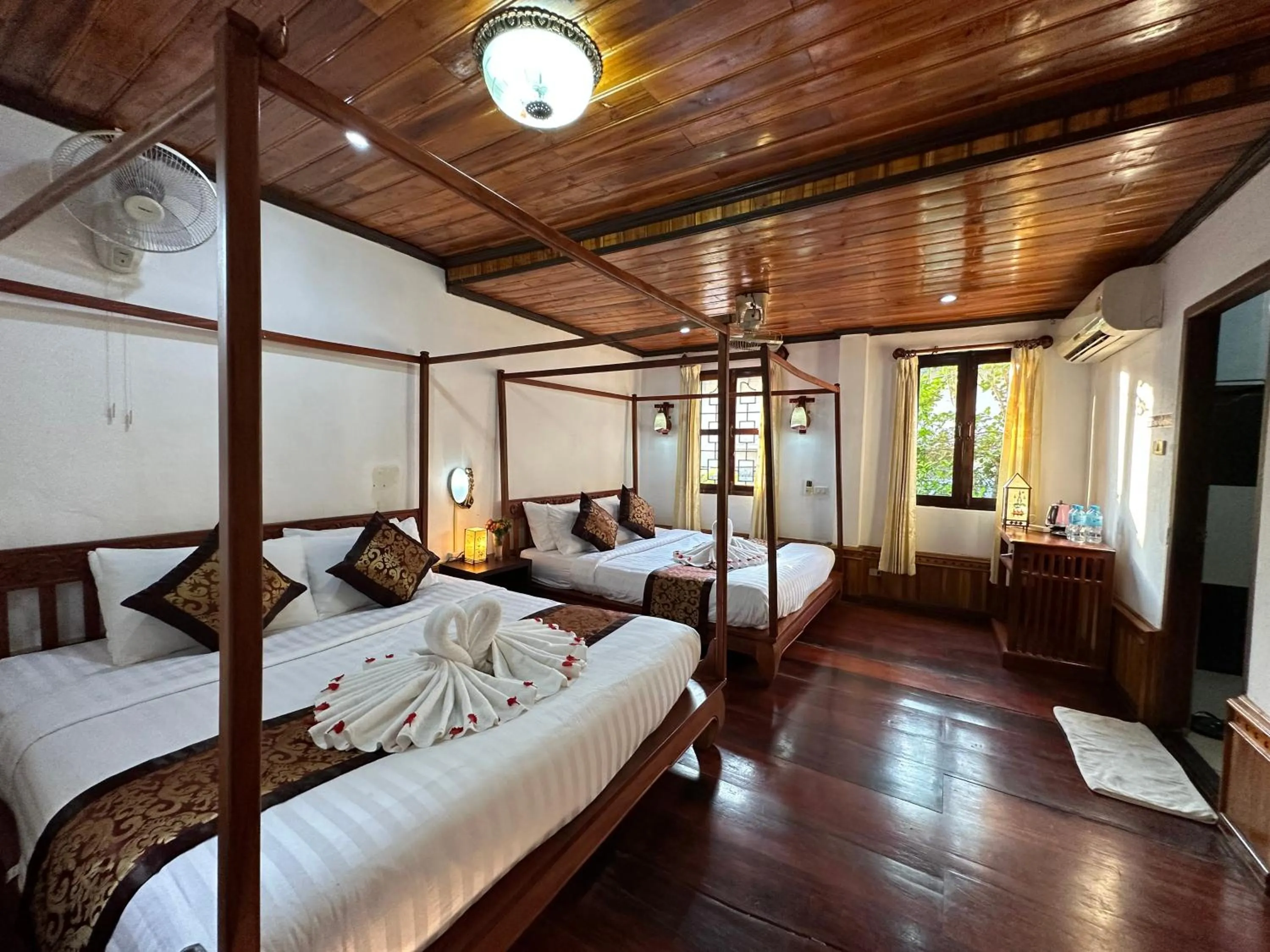Bed in Villa Thida Mekong Riverside