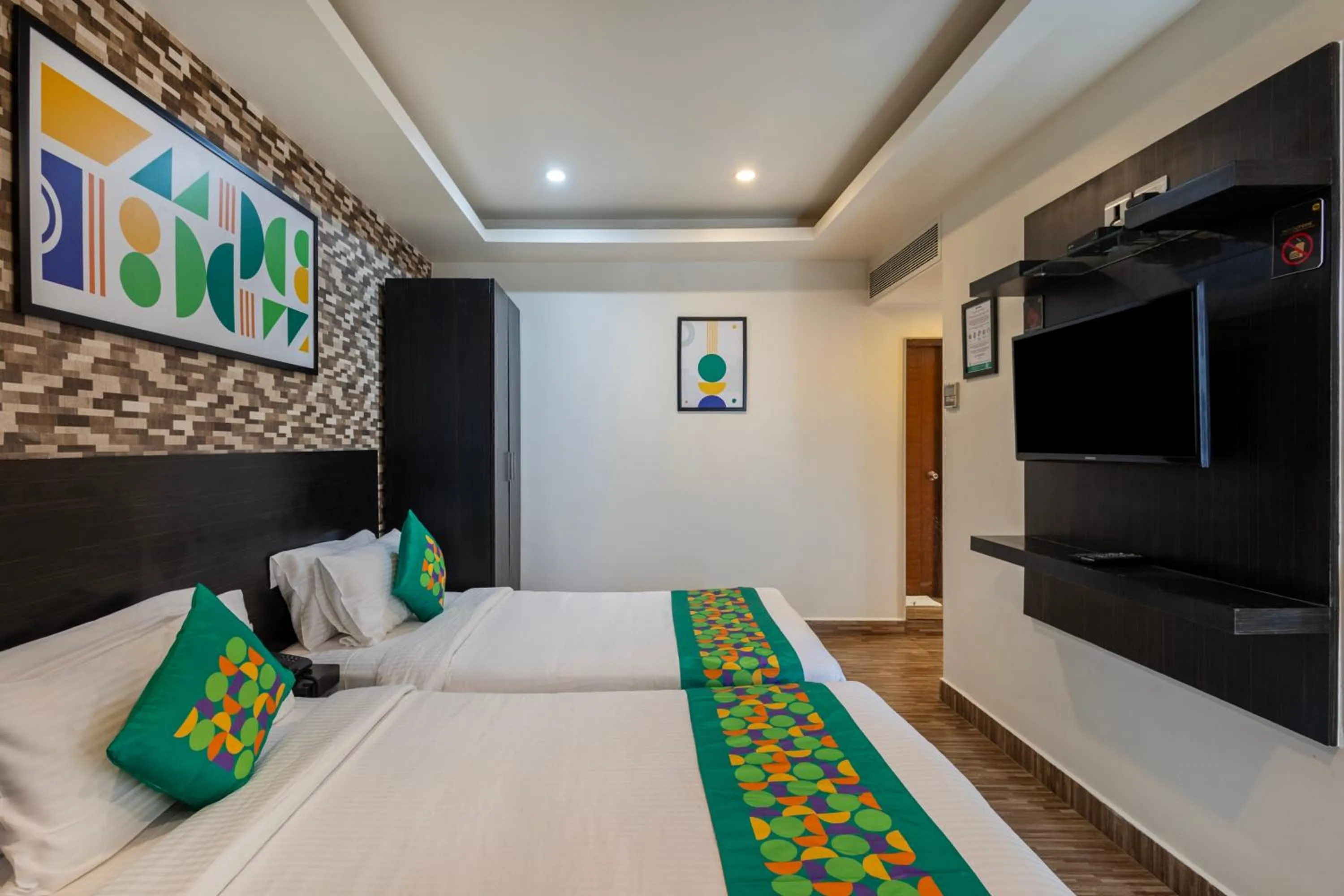 Bedroom, Bed in Treebo Premium Twin Star