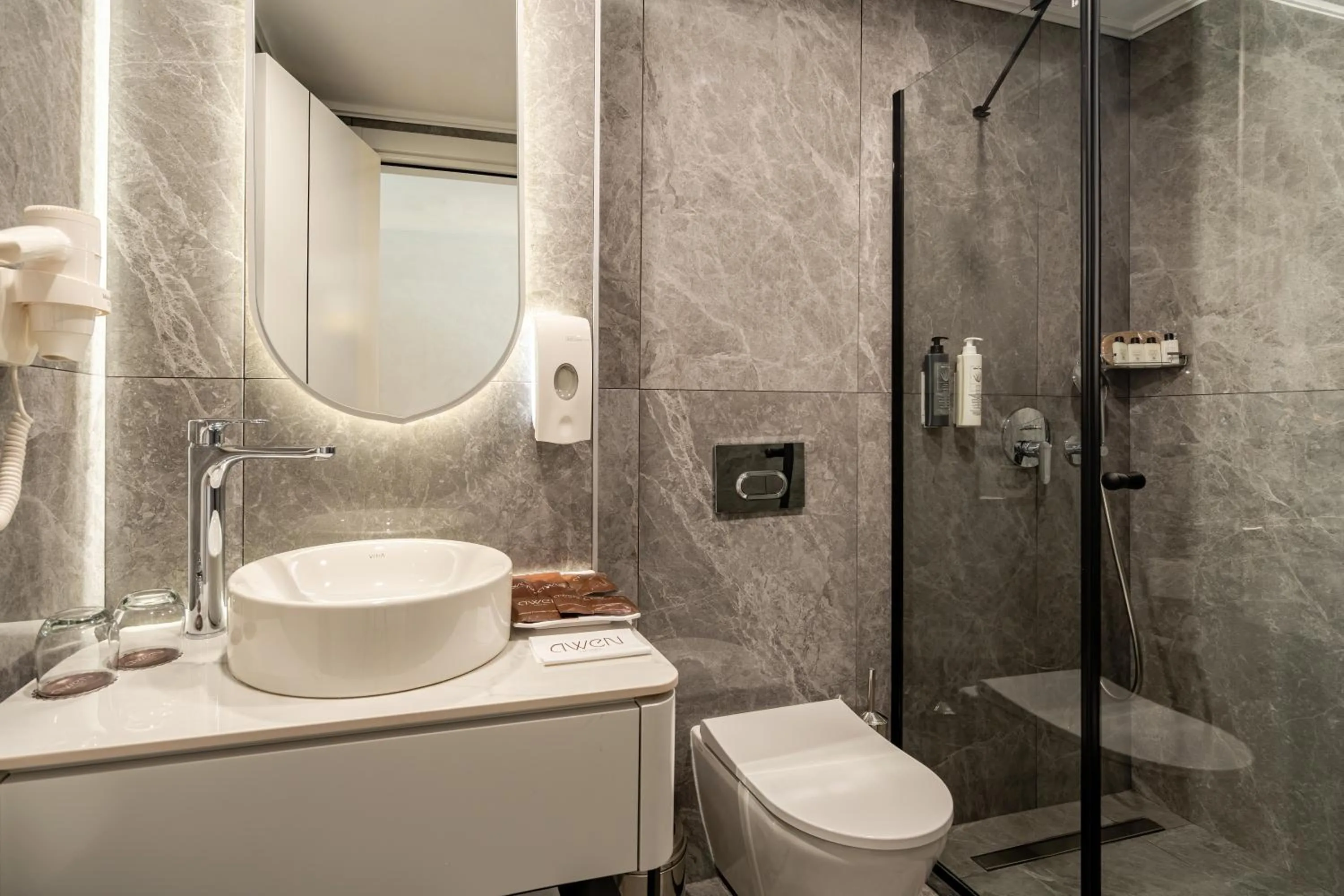 Shower in Awen Lara Hotel