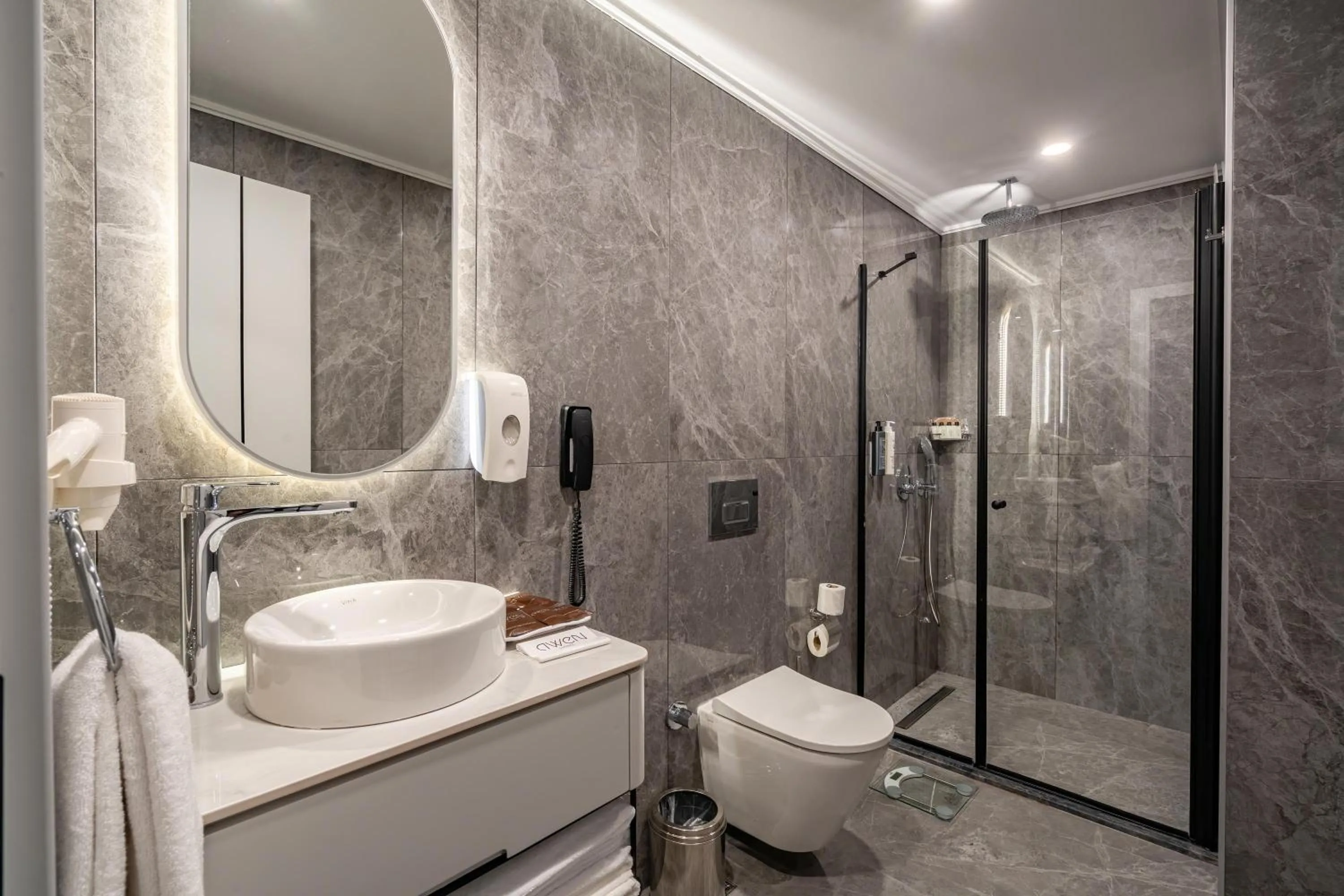 Shower in Awen Lara Hotel