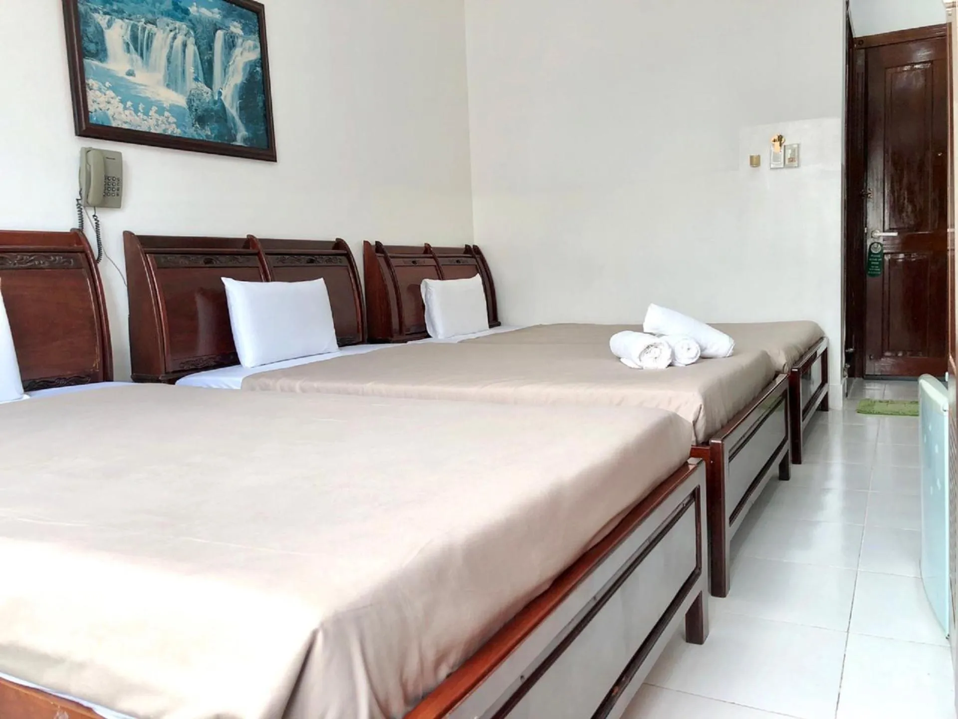 Bed in Saigon Cozy Hotel