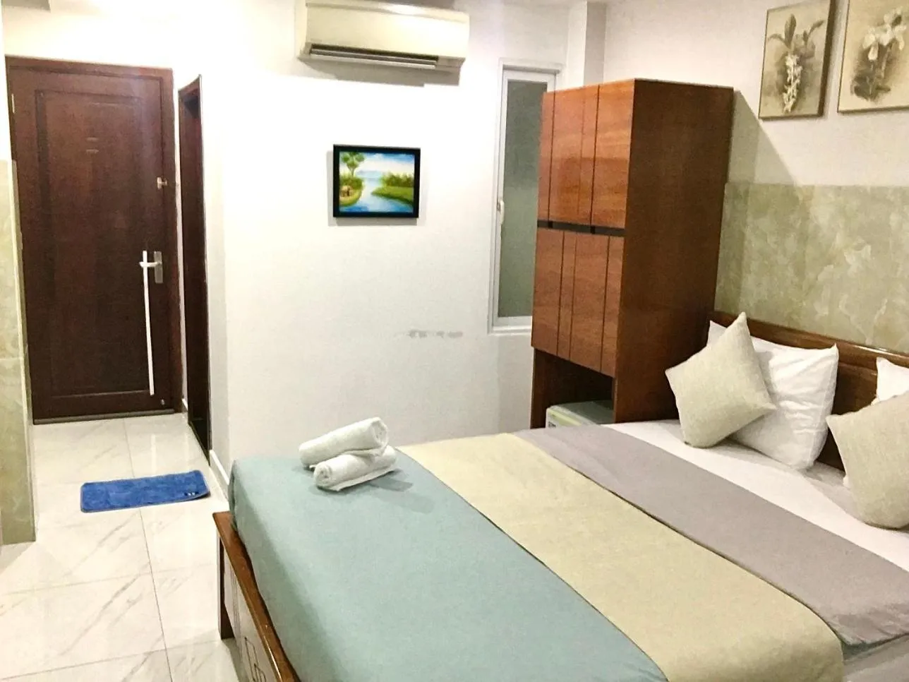 Bed in Saigon Cozy Hotel