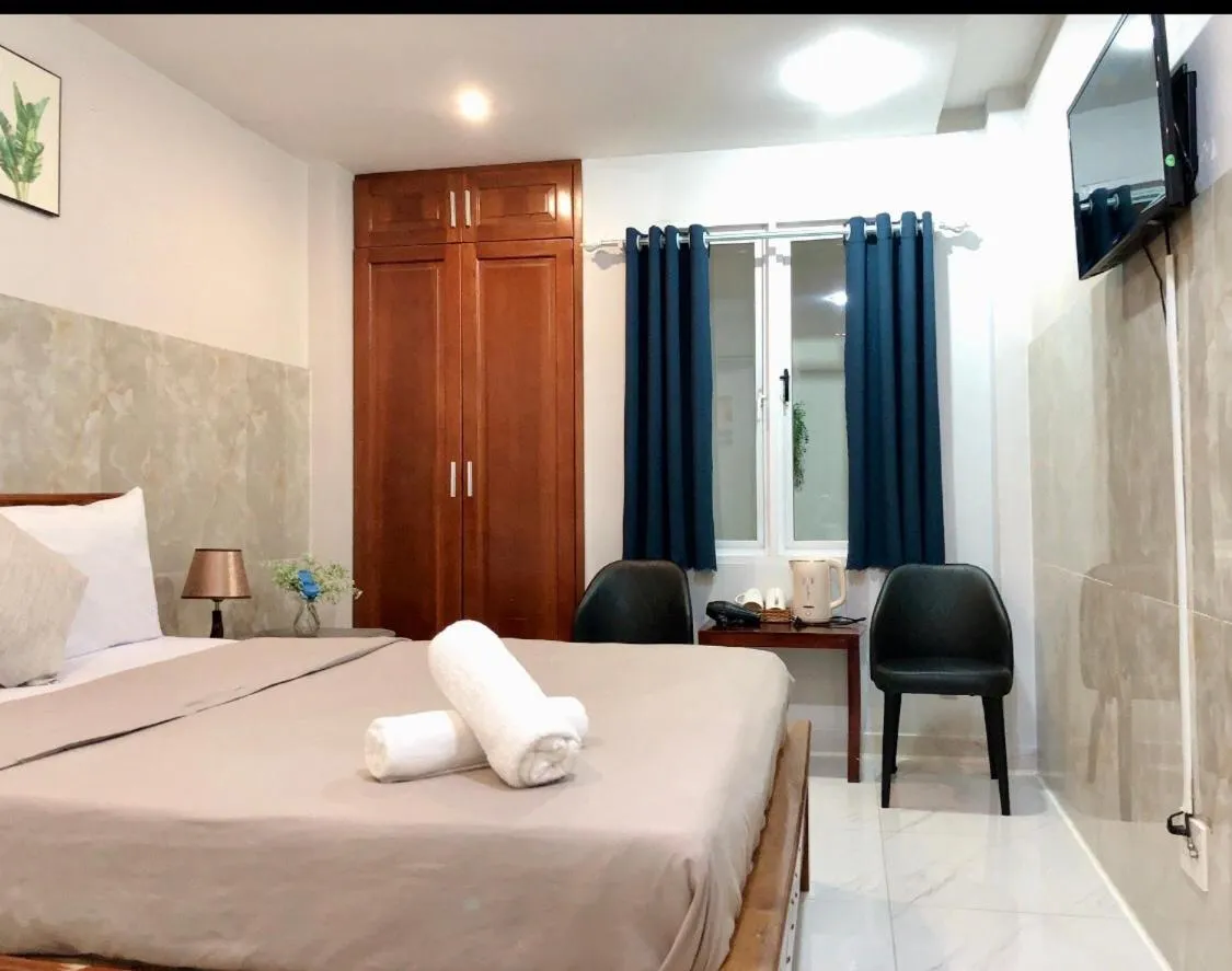 Bed in Saigon Cozy Hotel