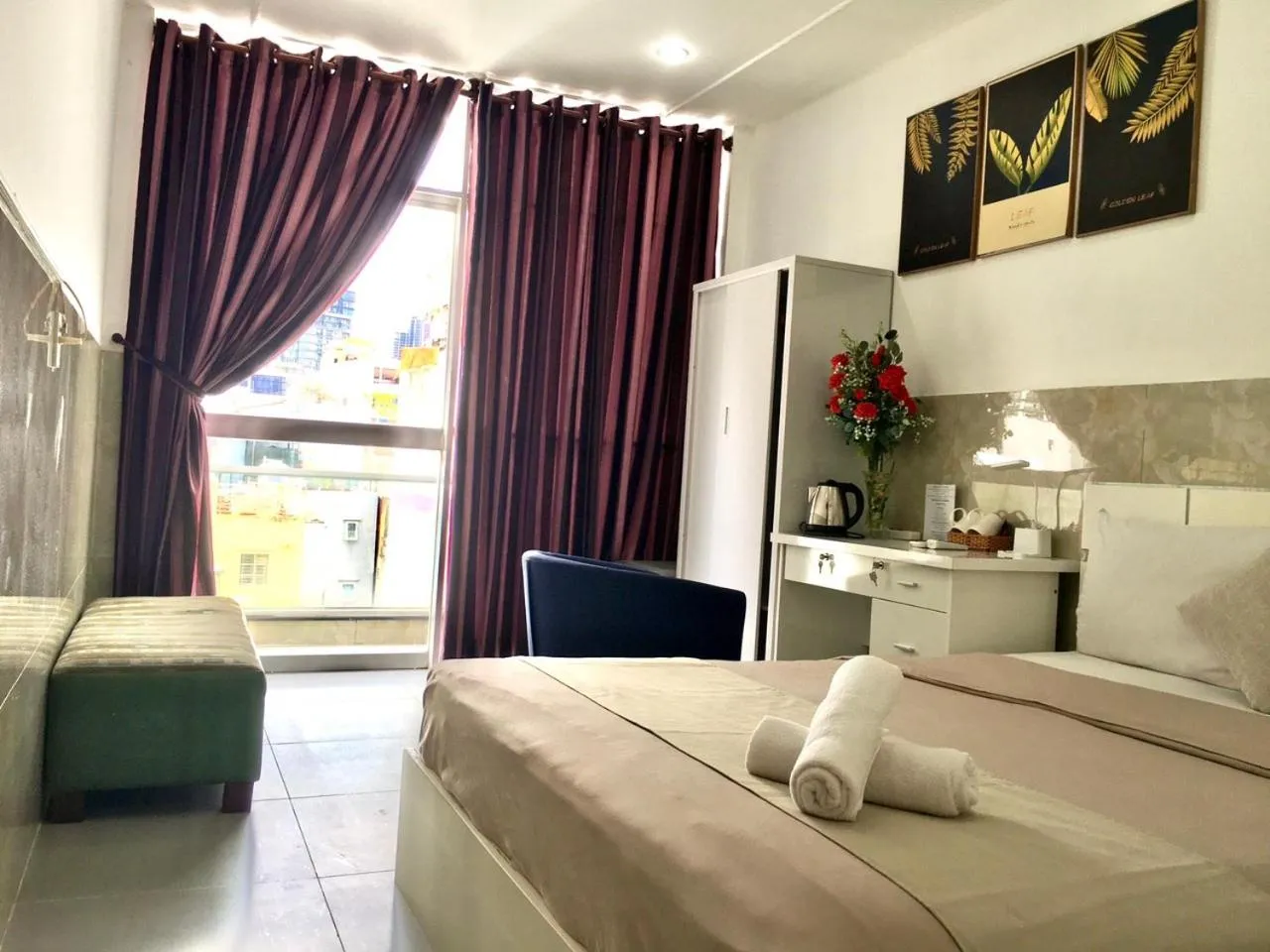 Deluxe Room (2 Adults + 1 Child) in Saigon Cozy Hotel