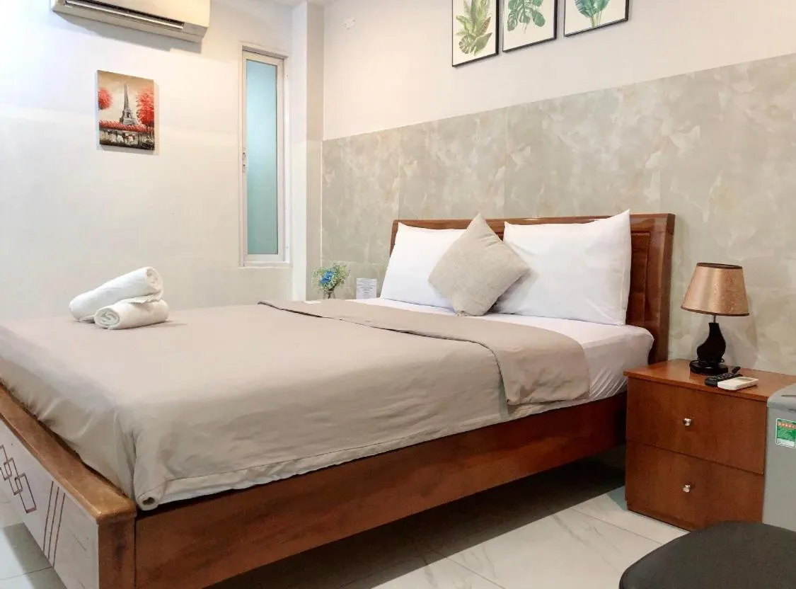 Bed in Saigon Cozy Hotel