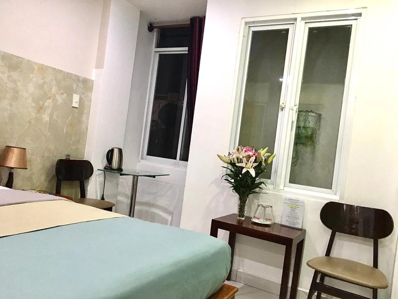 Bed in Saigon Cozy Hotel