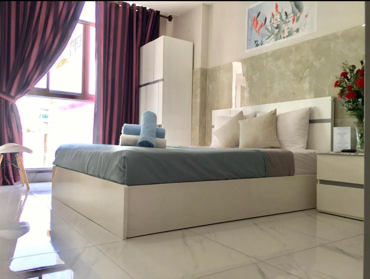 Bed in Saigon Cozy Hotel